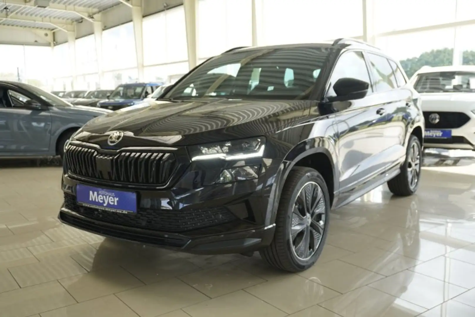 Skoda Karoq Sportline 1,5TSI DSG aAHK/Matrix/Kessy/Kamera Zwart - 1