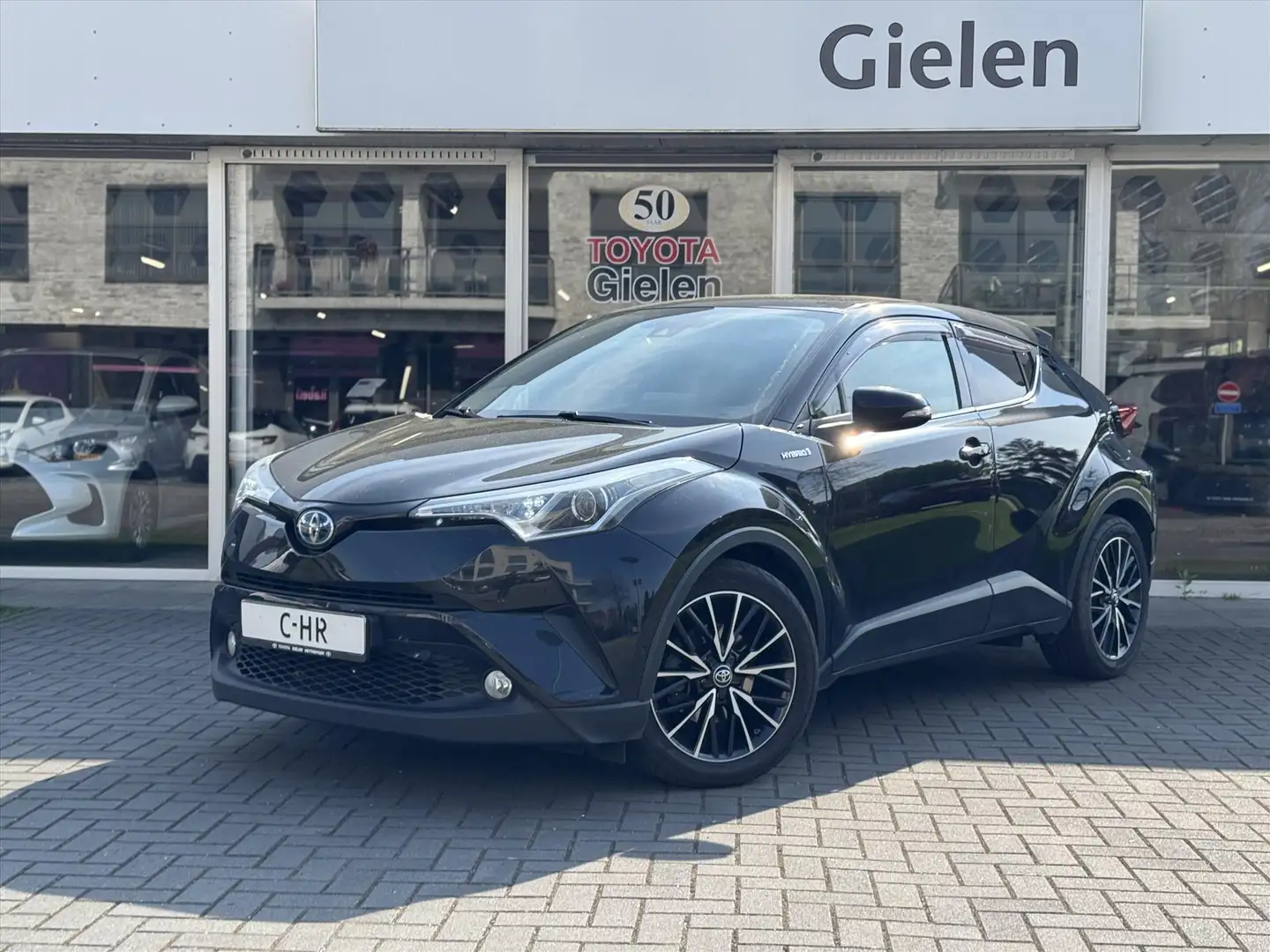 Toyota C-HR 1.8 Hybrid Executive JBL | Trekhaak, Leer, Stoelve Negru - 1