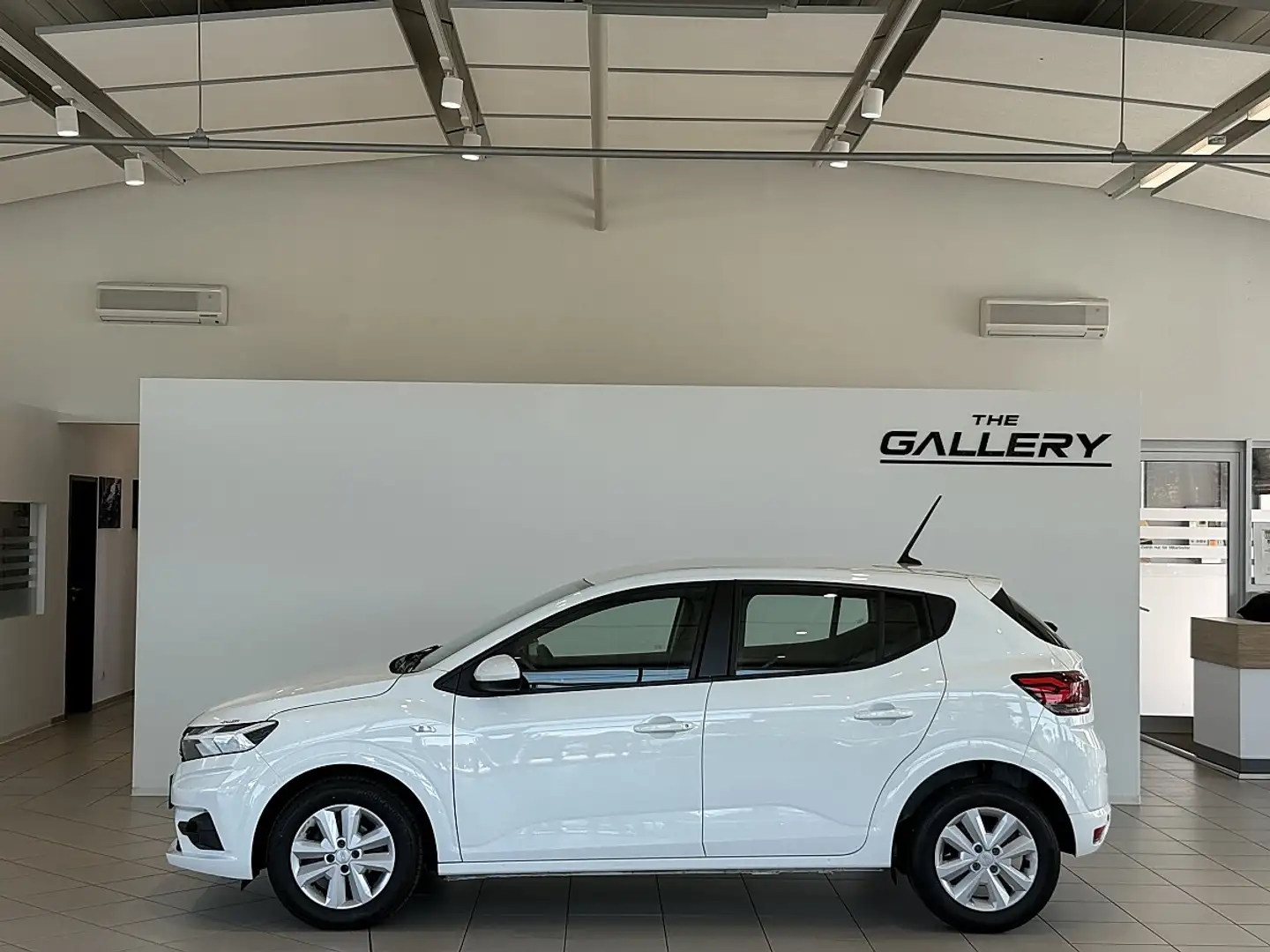 Dacia Sandero Access SCe 65*PDC*LED*Tempomat Weiß - 1