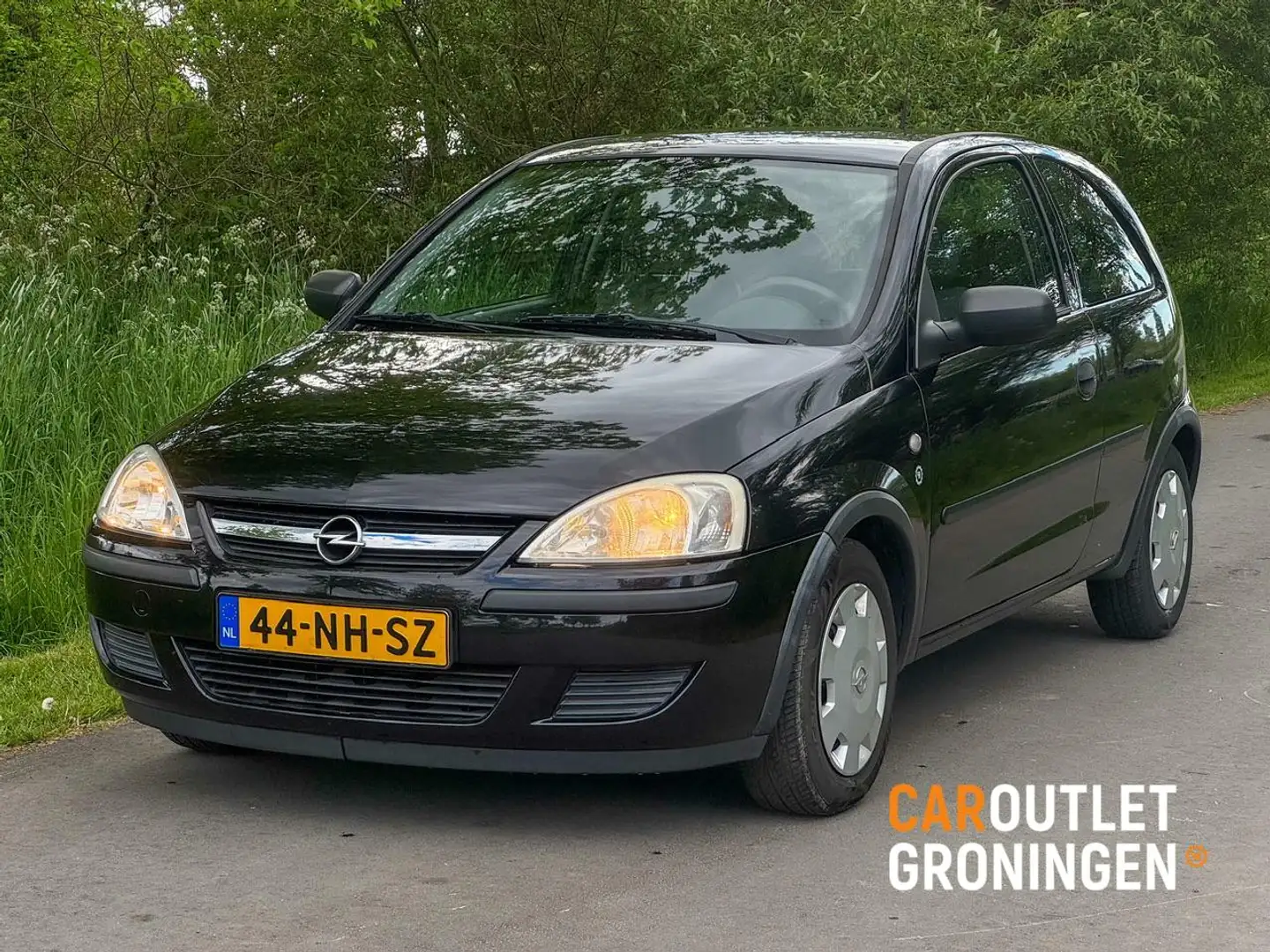 Opel Corsa 1.2-16V Essentia | AIRCO | NAP | GOED OH | NWE APK Zwart - 1