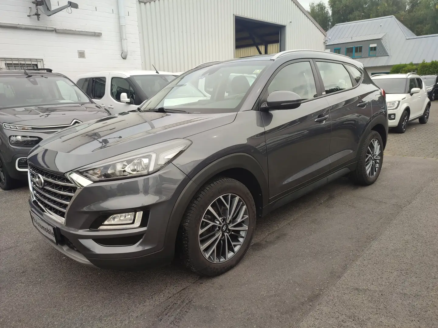 Hyundai TUCSON Tucson 1.6 GDi Klimaaut/Navi+Cam/Automatik Gris - 1