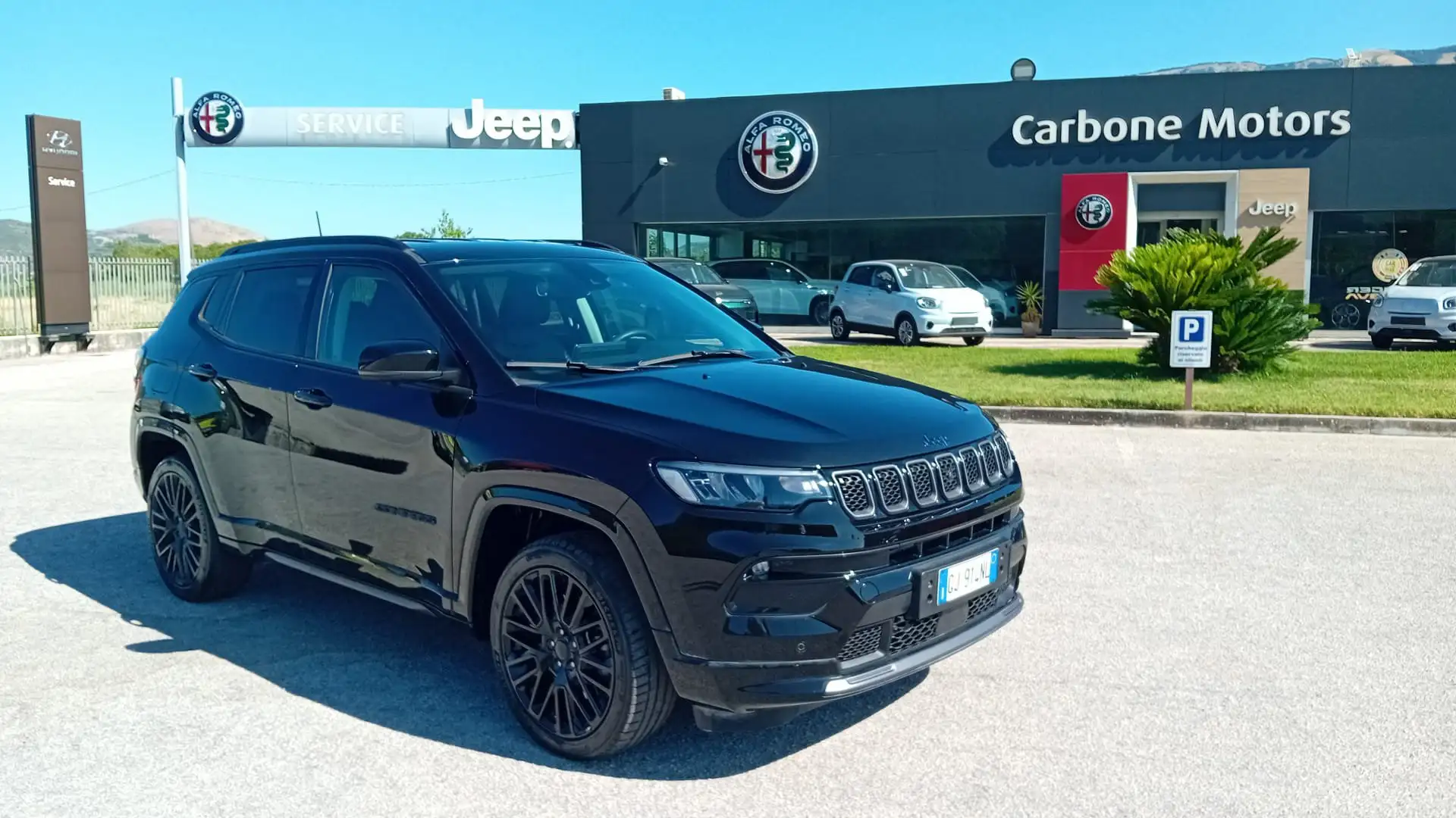 Jeep Compass 1.3 T4 240CV PHEV AT6 4xe S Zwart - 1