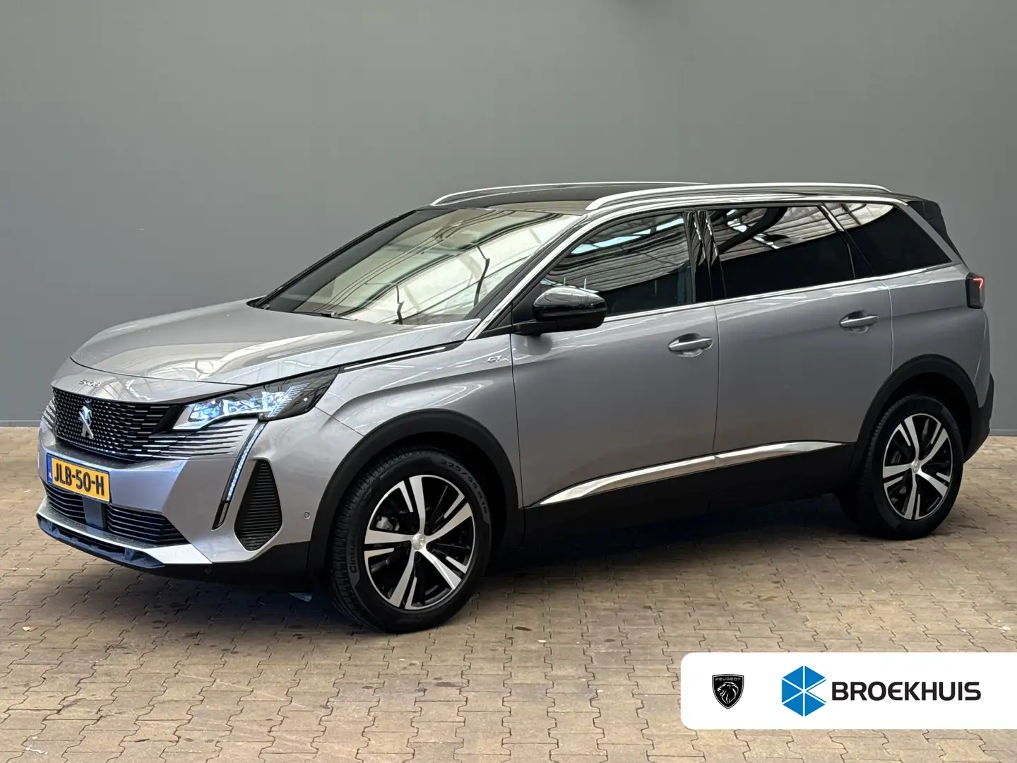 Peugeot 5008 1.2 Hybrid 136 GT Elek. Achterklep | Adaptieve Cru Gris - 1