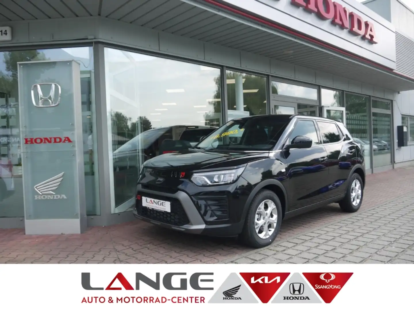 KGM Tivoli 1.5 T-GDi Nomad Navi SHZ Temp Tel.-Vorb. PDC Regen Schwarz - 1