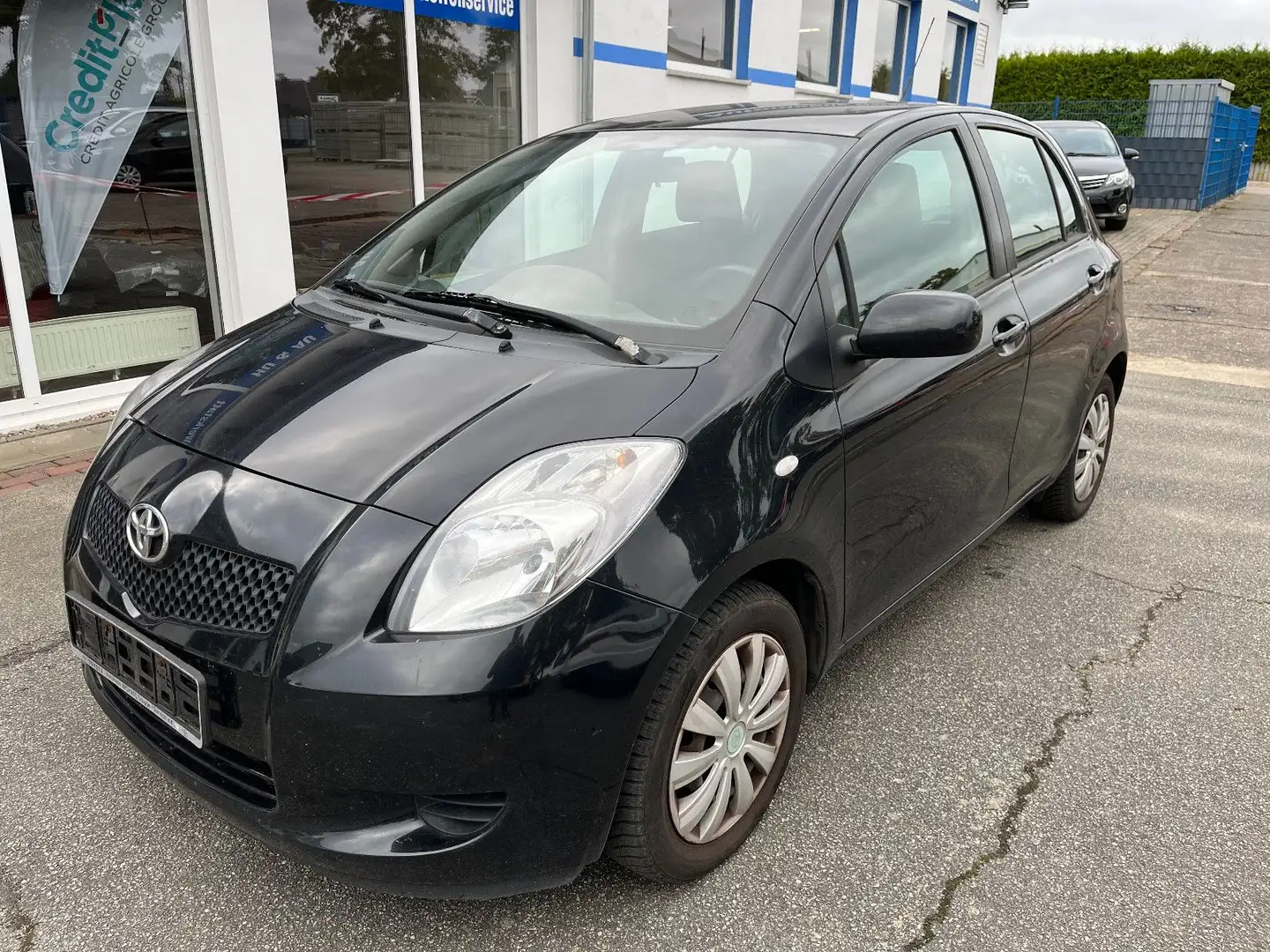 Toyota Yaris 1,0*Sol*Klima1.Hand/5-türig/EFH/el.Sp. Schwarz - 1
