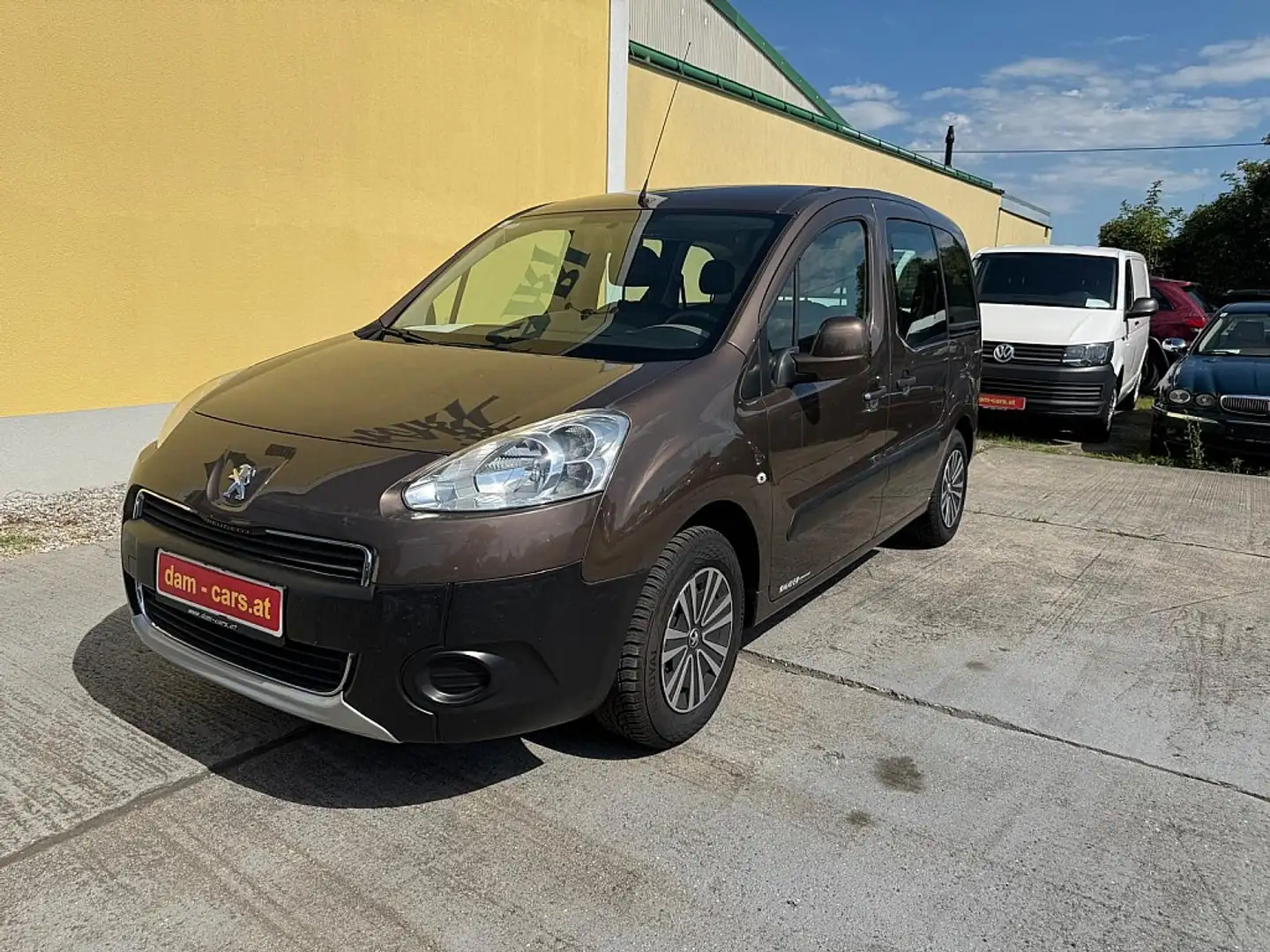 Peugeot Partner Tepee Lion Edition 1,6 e-HDi 92 FAP Bruin - 1