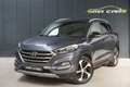 Hyundai TUCSON 1.6 GDi 2WD Go-Benzine-Airco-Nav-Camera-Garantie Grijs - thumbnail 1