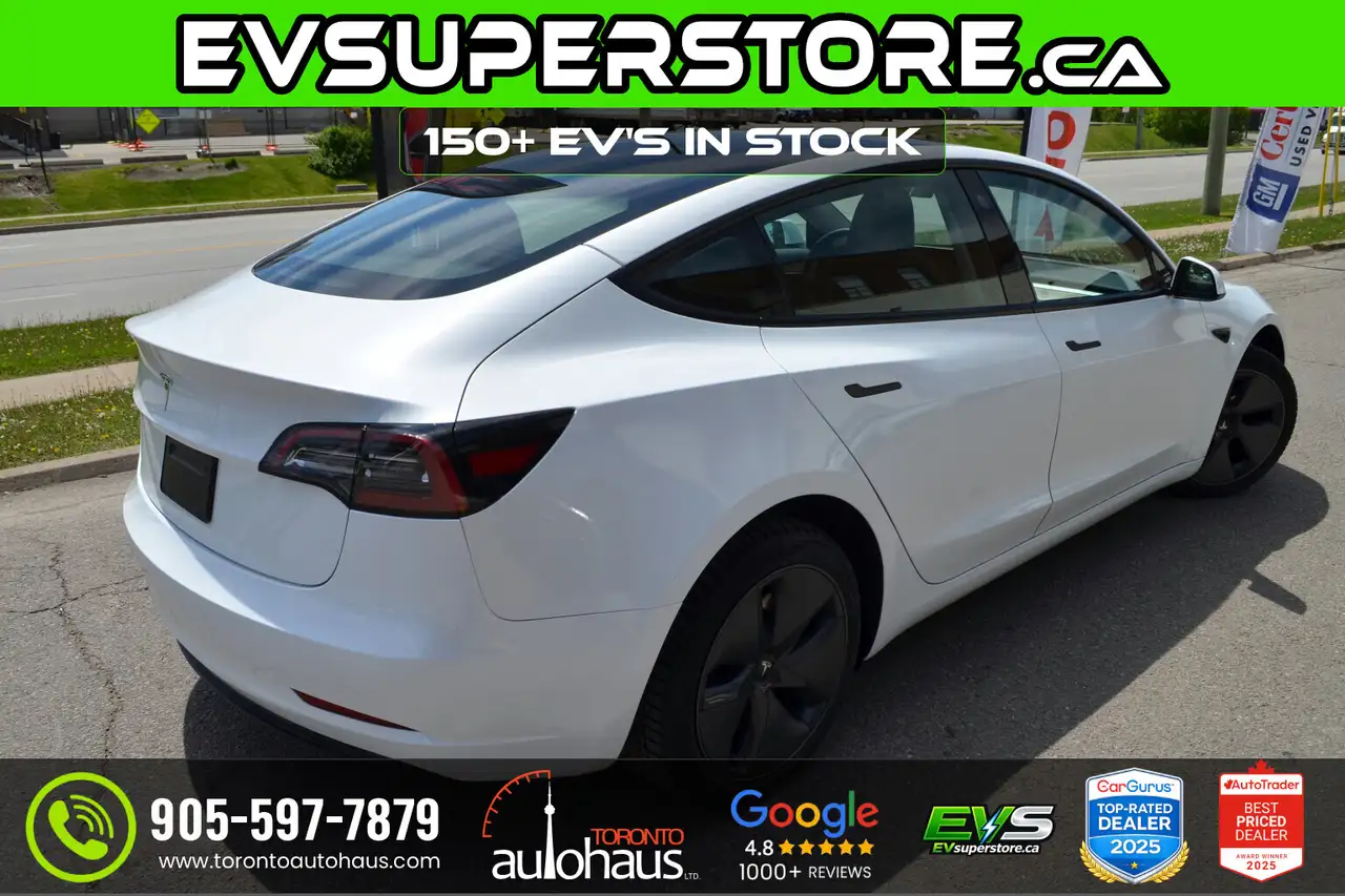 Tesla Model 3 photo Tesla Model 3