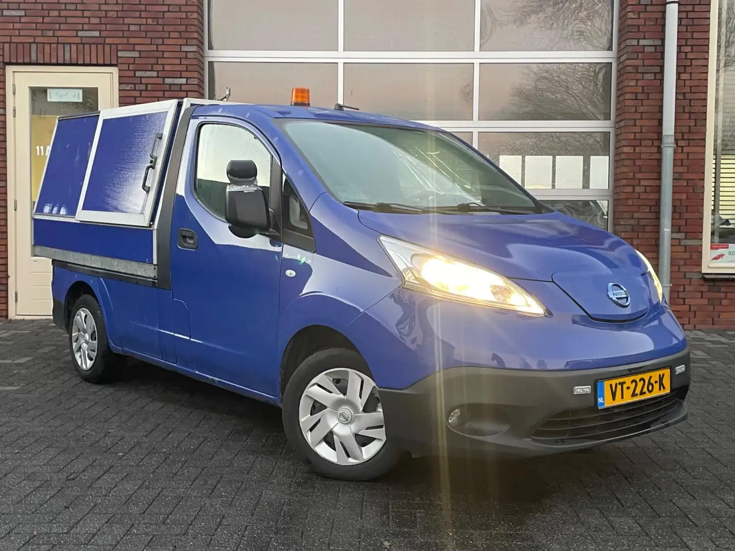 Nissan E-NV200 Optima | SOH 75% | Kipper Veegvuilopbouw | Cruise Bleu - 2