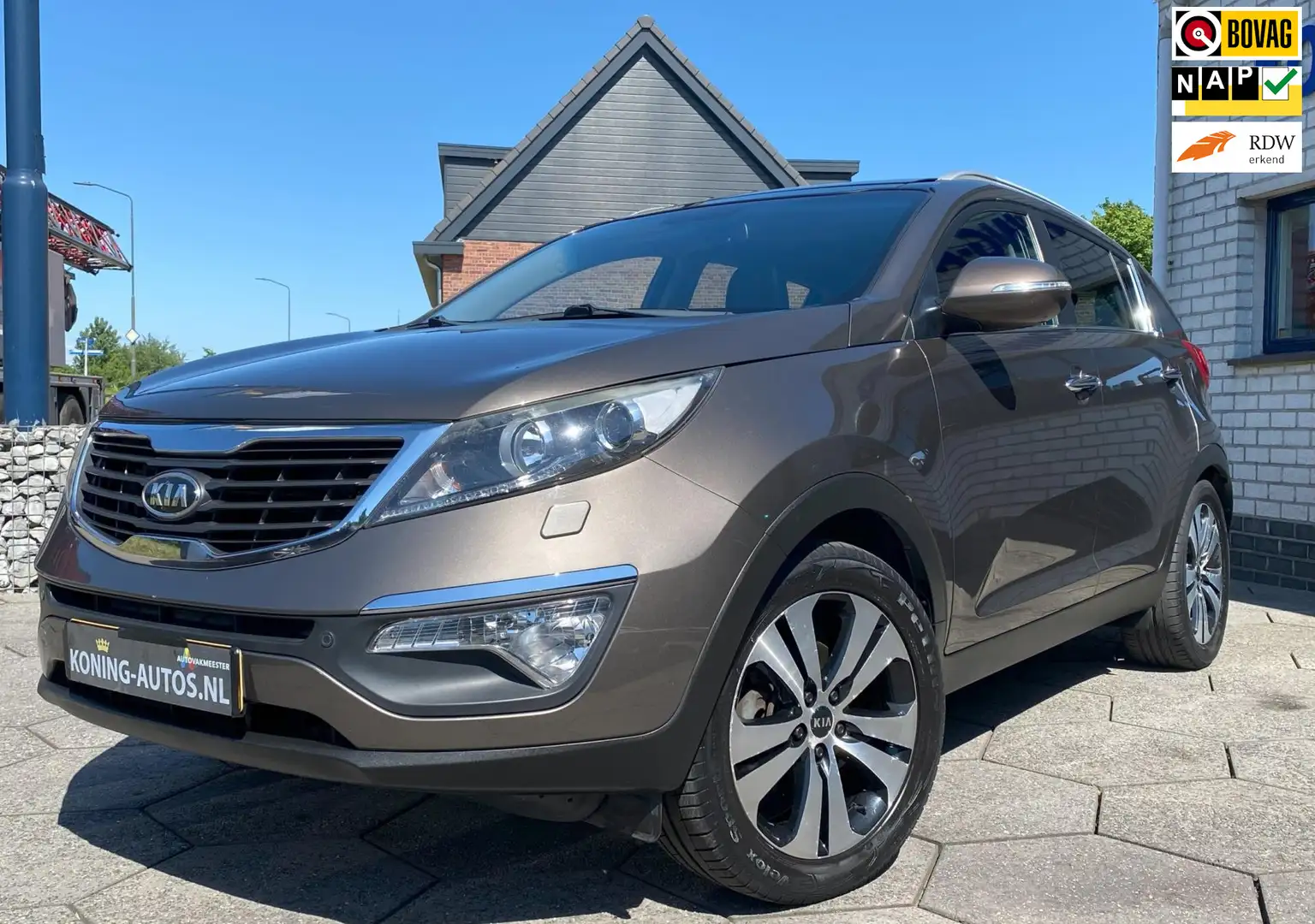 Kia Sportage 2.0 X-clusive Camera/ Leer/ Pano/ Clima Marrone - 1