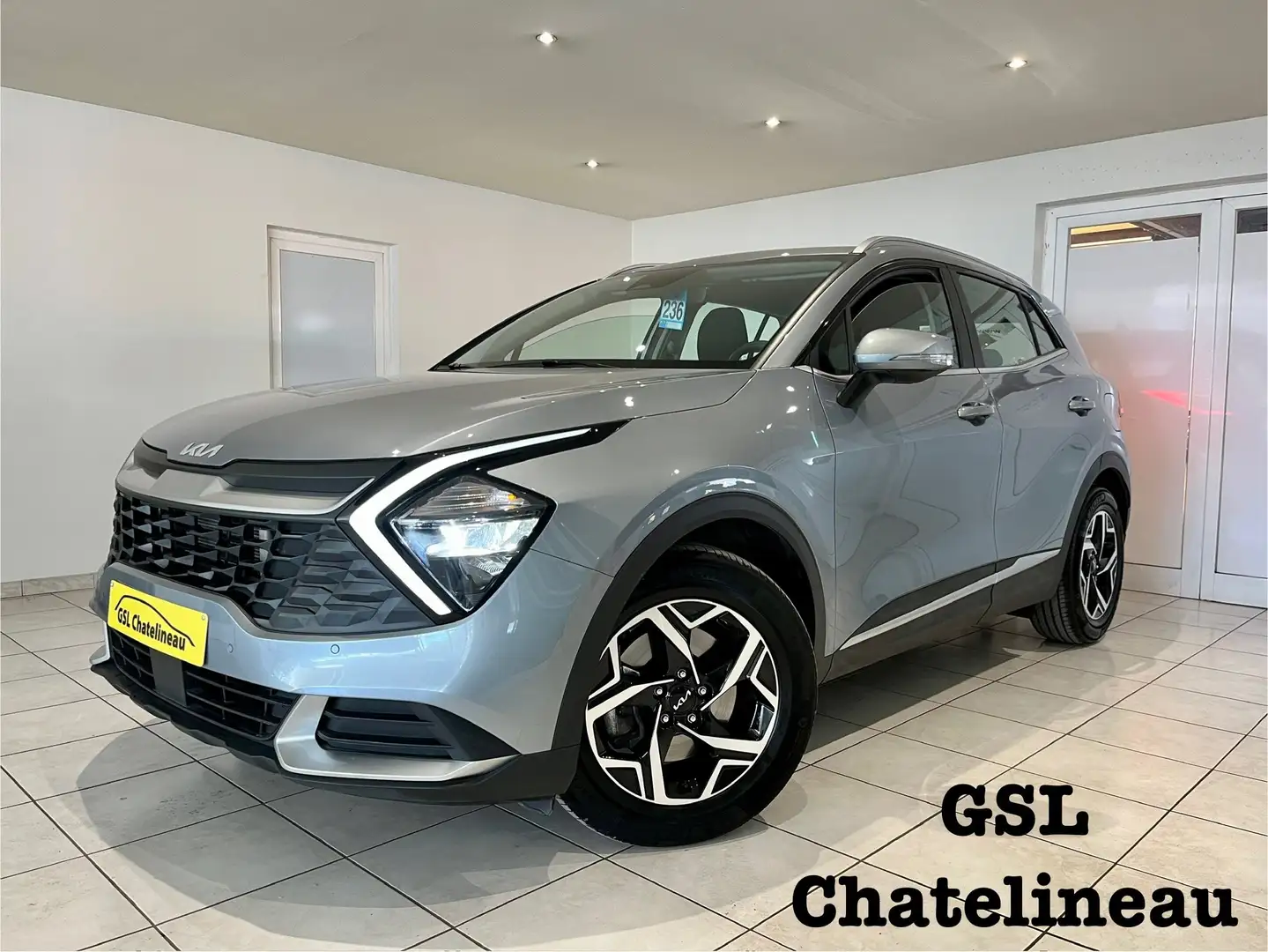 Kia Sportage 1.6T-GDi 160cv MHEV 2024 Airco/Cruise/Carplay/Navi Grijs - 1