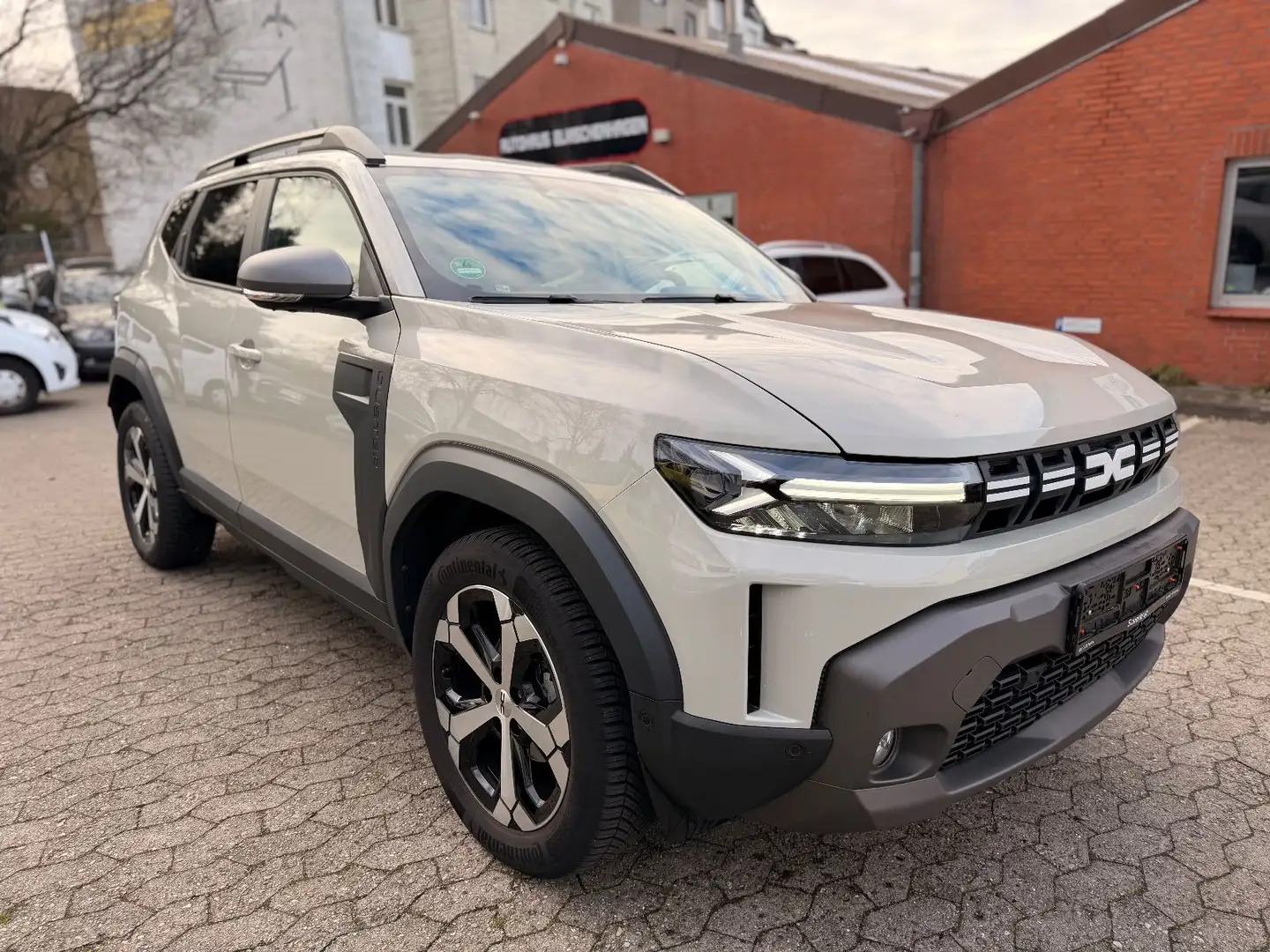 Dacia Duster III 1.0 GAS/Benzin Journey*360CAM*AHK*LED Beige - 1
