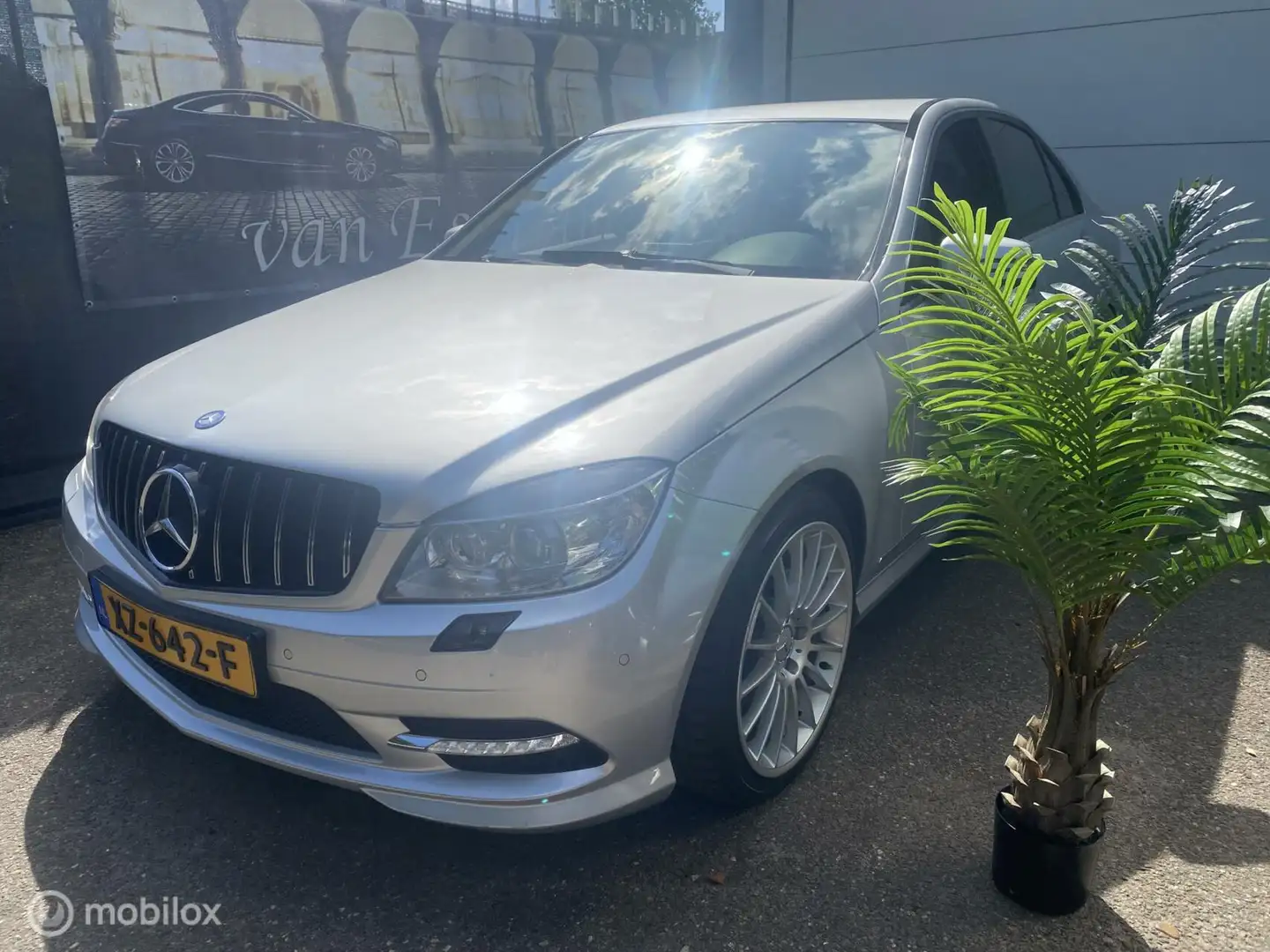 Mercedes-Benz C 200 CGI 181.DKM ECC NAVI HARMAN KARDON CRUISE PDC Grijs - 1