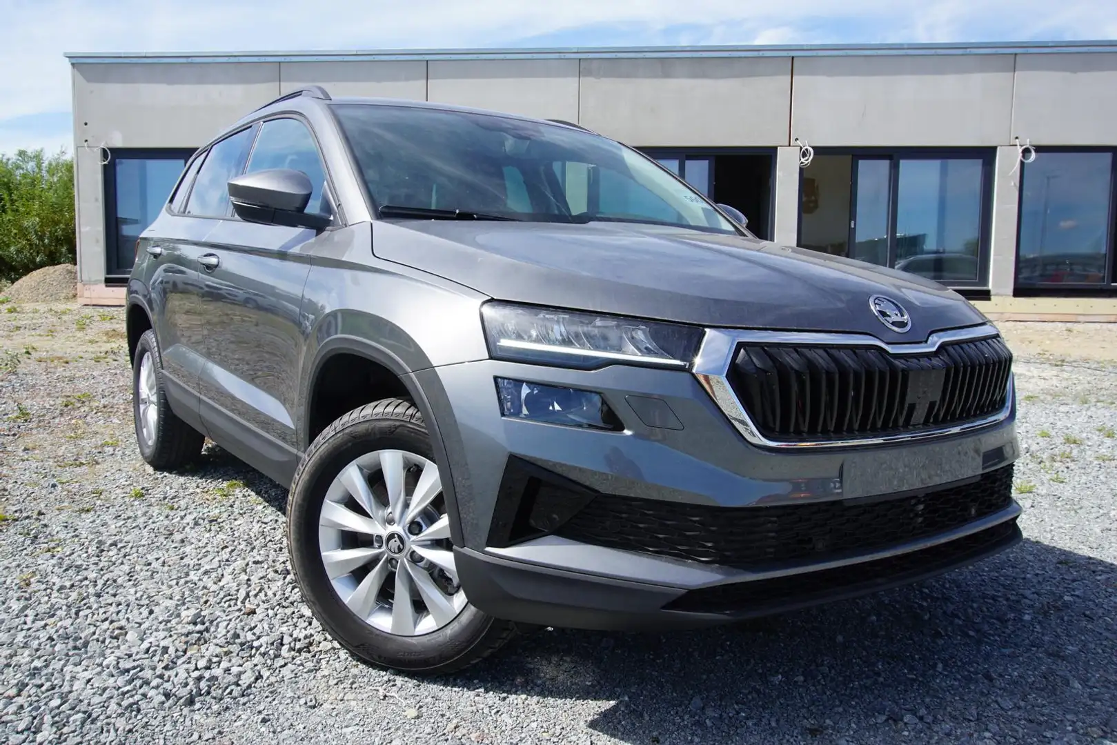 Skoda Karoq 1.5TSI DSG AHK Navi/MirrorLi Kamera SHZ Grijs - 1