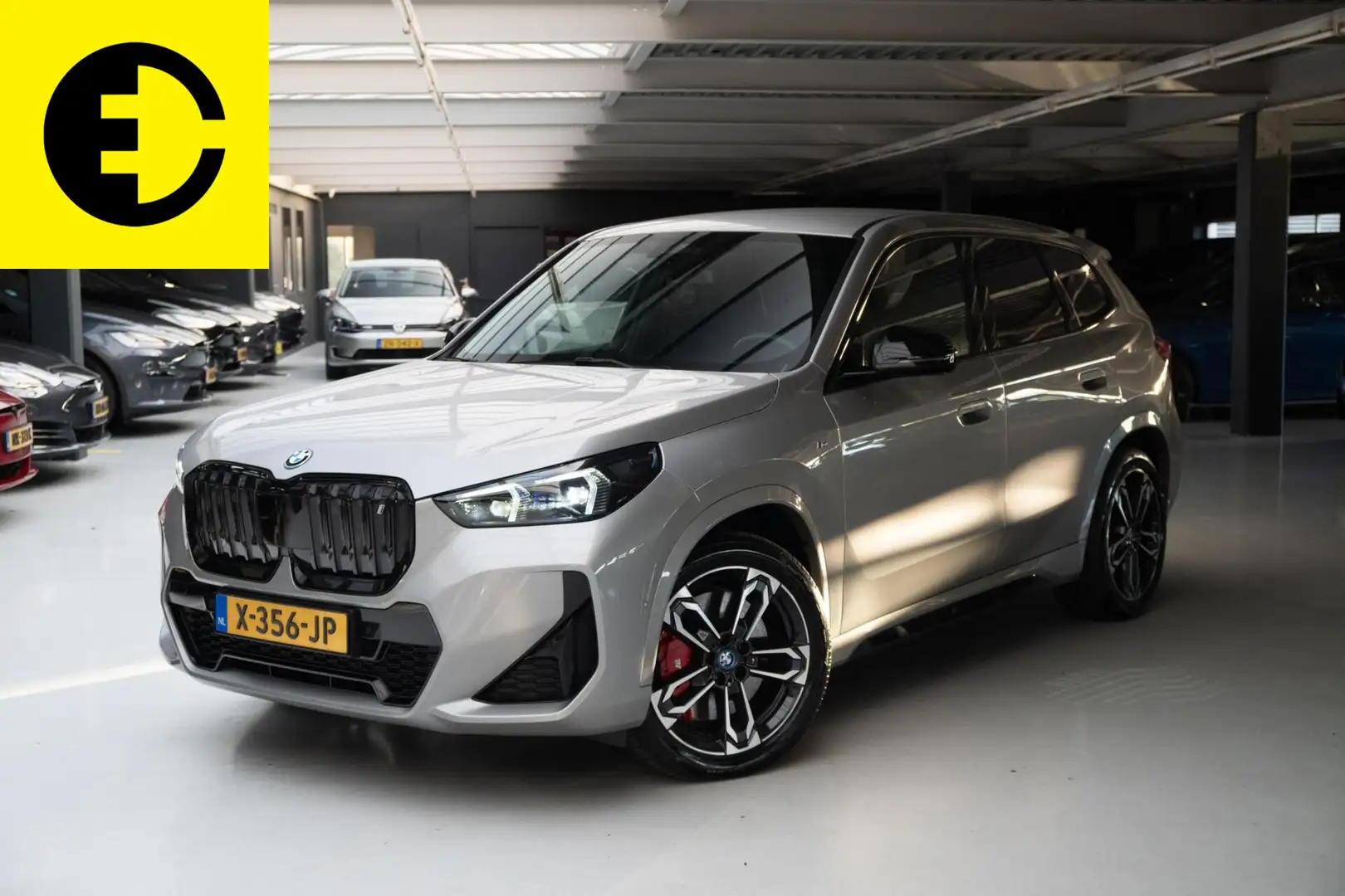 BMW iX1 xDrive30 67 kWh | M Pakket | Achteruitrijcamera | Grigio - 1