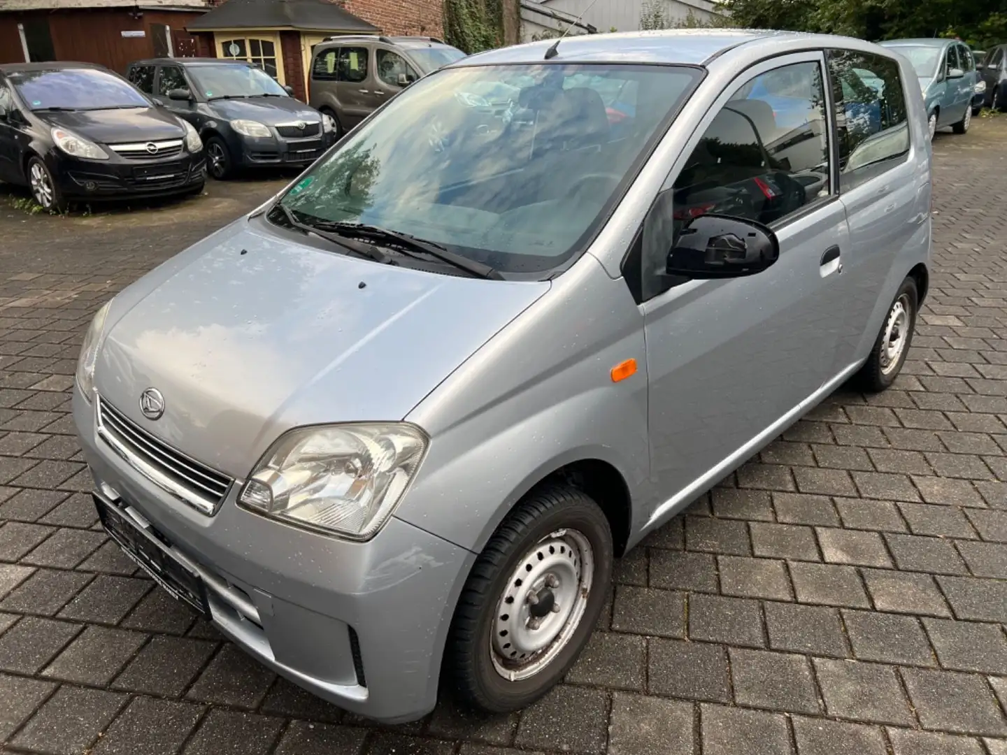 Daihatsu Cuore Plus 1.0 TÜV NEU/ALLWETTER/KLIMA/++++ Silber - 1