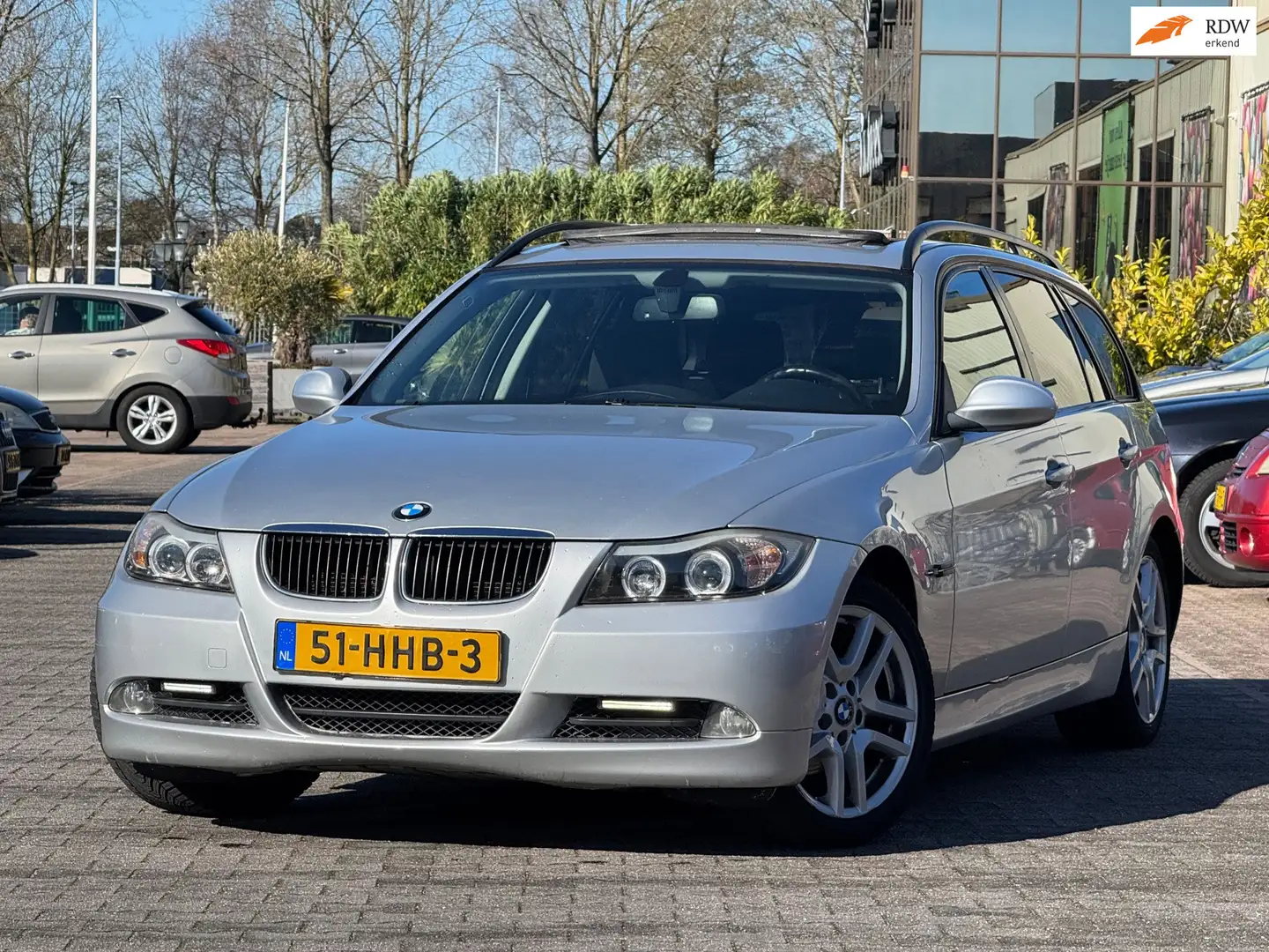 BMW 320 3-serie Touring 320i High Executive | Panoramadak Grau - 1