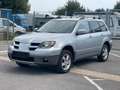 Mitsubishi Outlander 2.4 4X4 Sport TÜV 02.2026 Silber - thumbnail 1