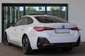 BMW i4 eDrive40 84 kWh M Sport | Panorama dak | Apple car Weiß - thumbnail 2