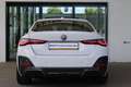 BMW i4 eDrive40 84 kWh M Sport | Panorama dak | Apple car Weiß - thumbnail 4