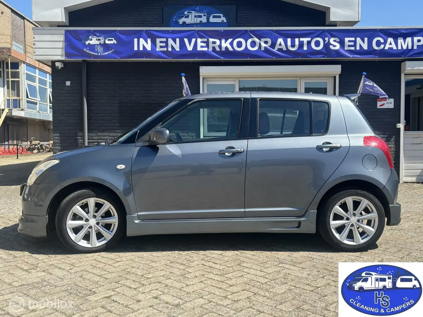 Suzuki Swift 1.3 4Grip Exclusive Gri - 1