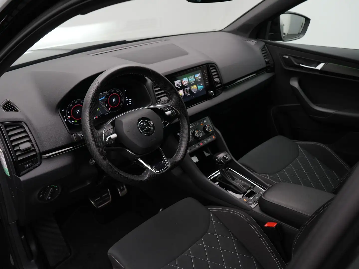 Skoda Karoq 1.5 TSI 150 pk DSG ACT Sportline Business | Trekha Zwart - 2