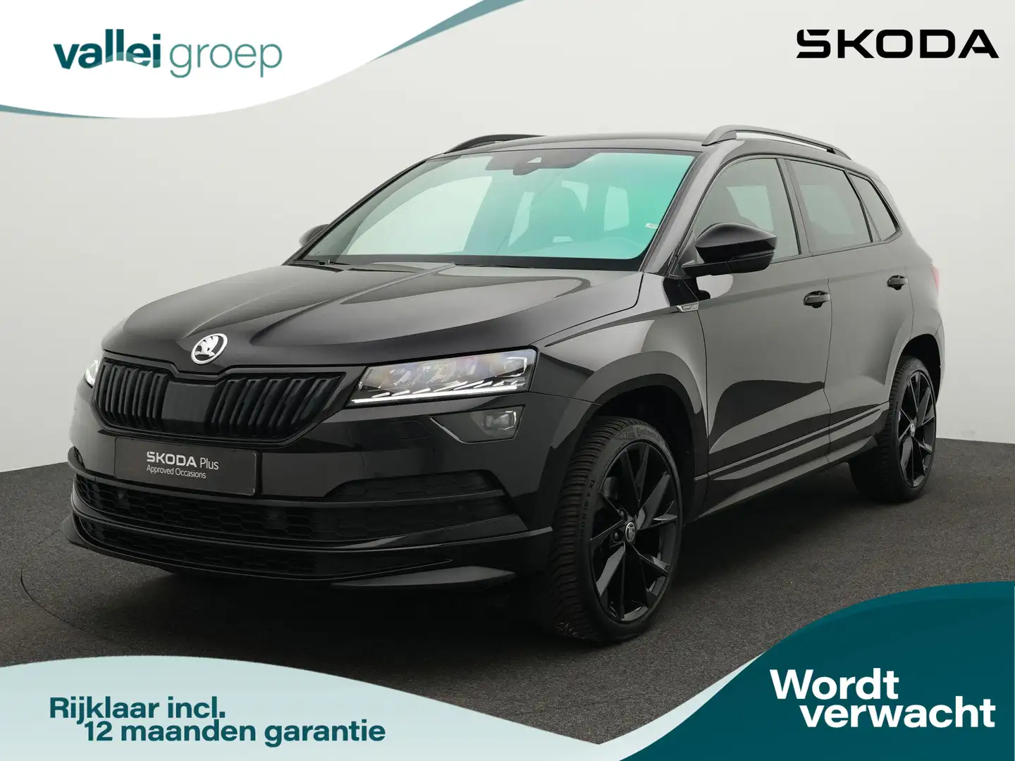 Skoda Karoq 1.5 TSI 150 pk DSG ACT Sportline Business | Trekha Zwart - 1