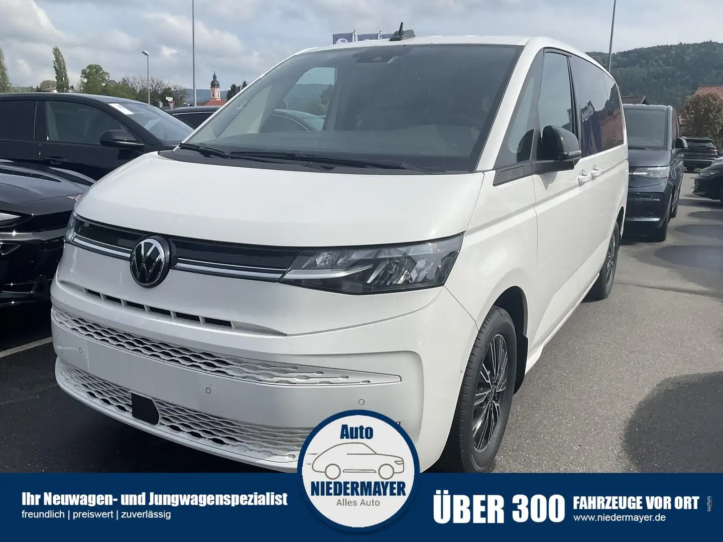 Volkswagen T7 Multivan TDI DSG lang Life, Teilleder, AHK, Navi, easyOpen, Blanc - 1