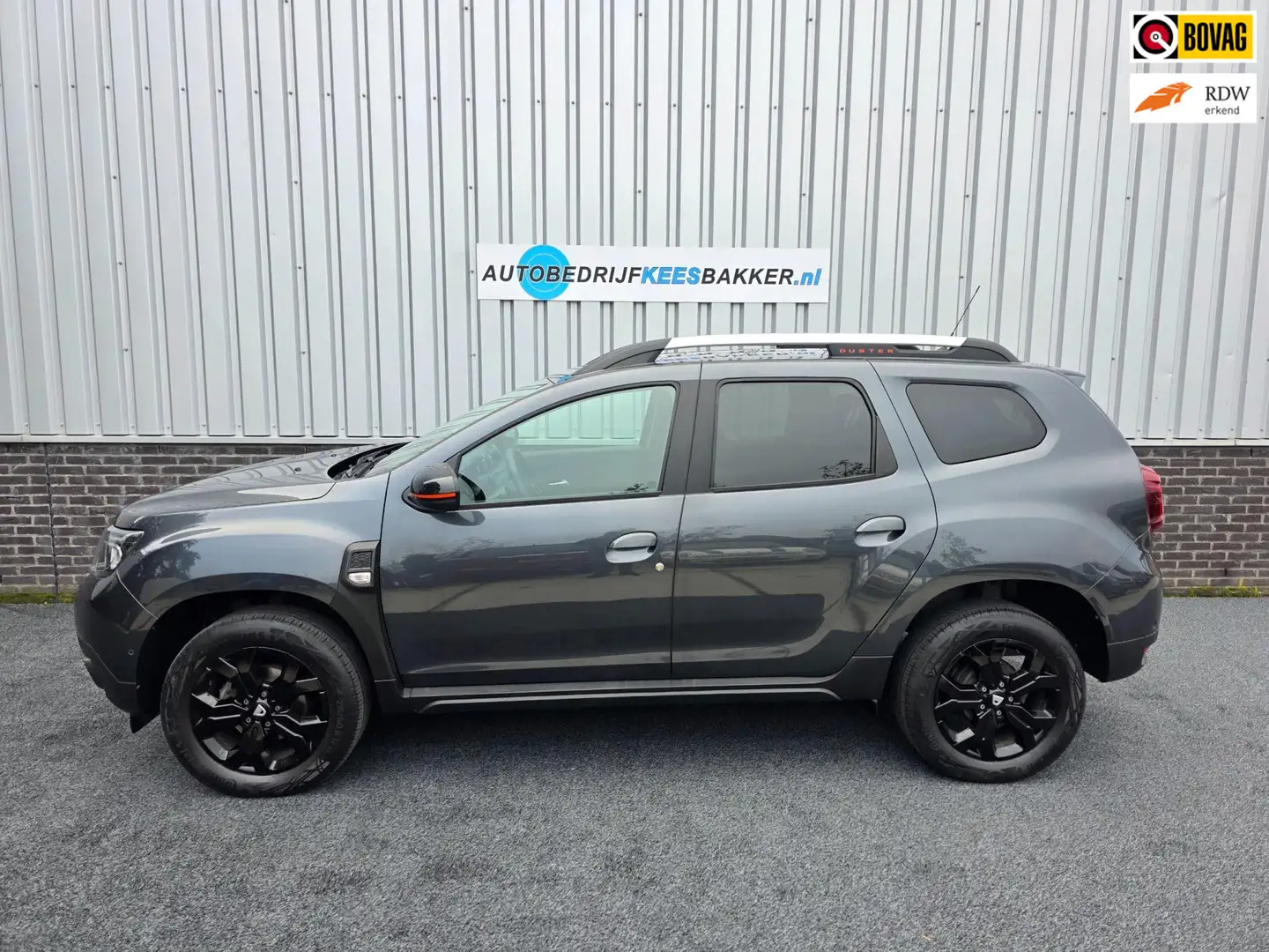 Dacia Duster 1.3 TCe 150 Journey / 360° Cam / Navi / Carplay / Grijs - 1