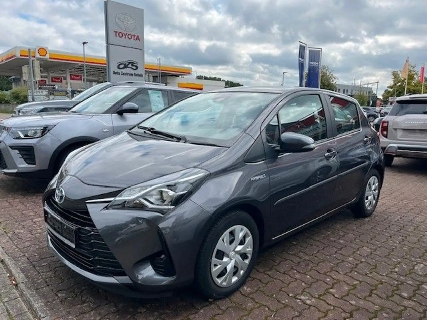 Toyota Yaris YARIS HYBRID,NAVI,ALLWETTERR.,GARANTIE BIS 2034 Grau - 1