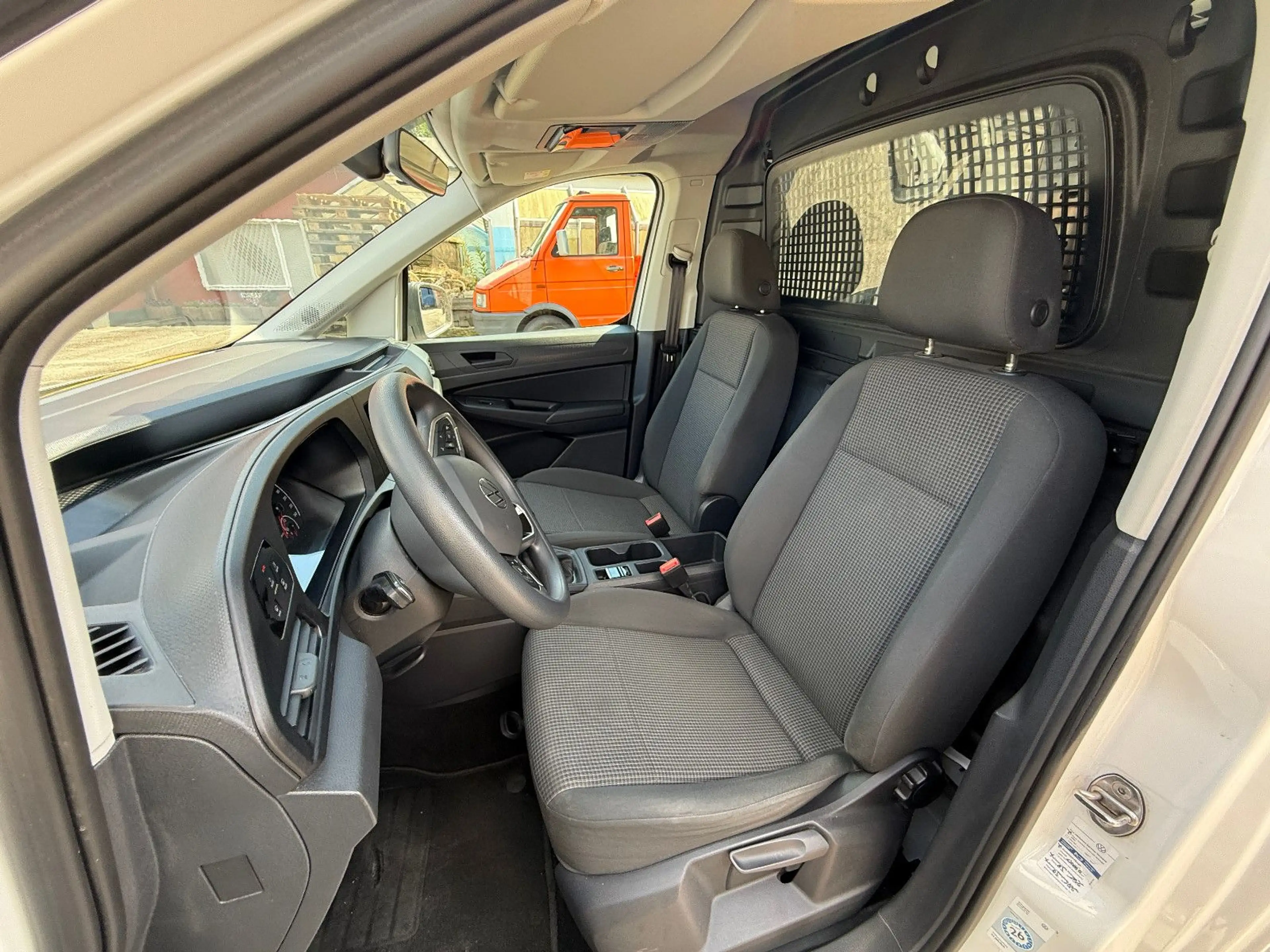 Volkswagen Caddy Cargo + 1. Hand + Sortimo + Navi + — photo 7