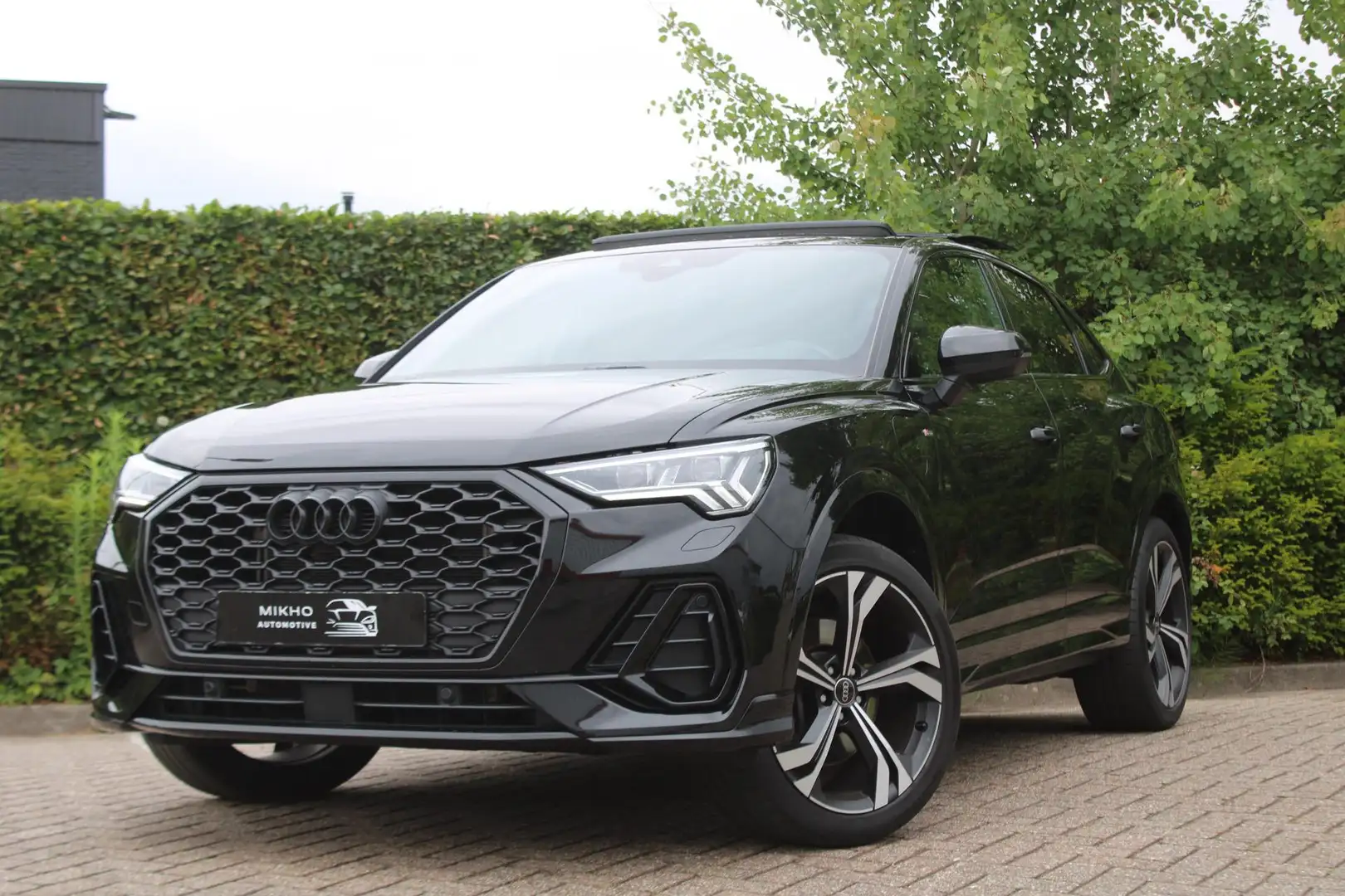 Audi Q3 Sportback 45 TFSIe | 3x S-Line | Panoramadak | Son Zwart - 1