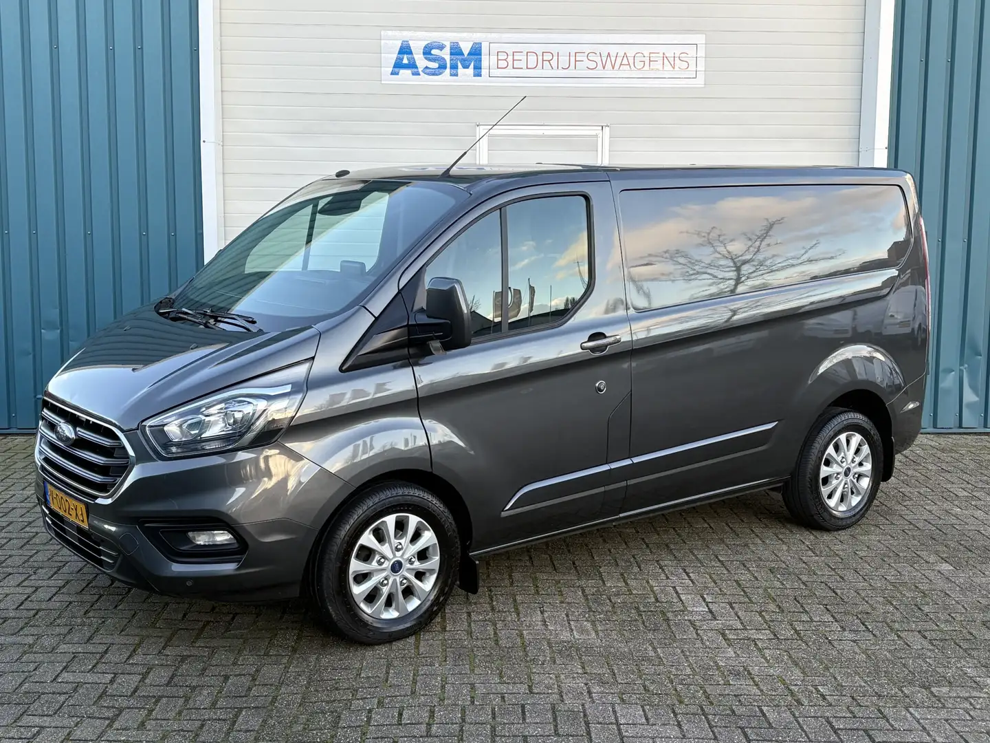Ford Transit Custom 280 2.0 131Pk TDCI L1H1 Limited / Cruise / Airco / Grijs - 1