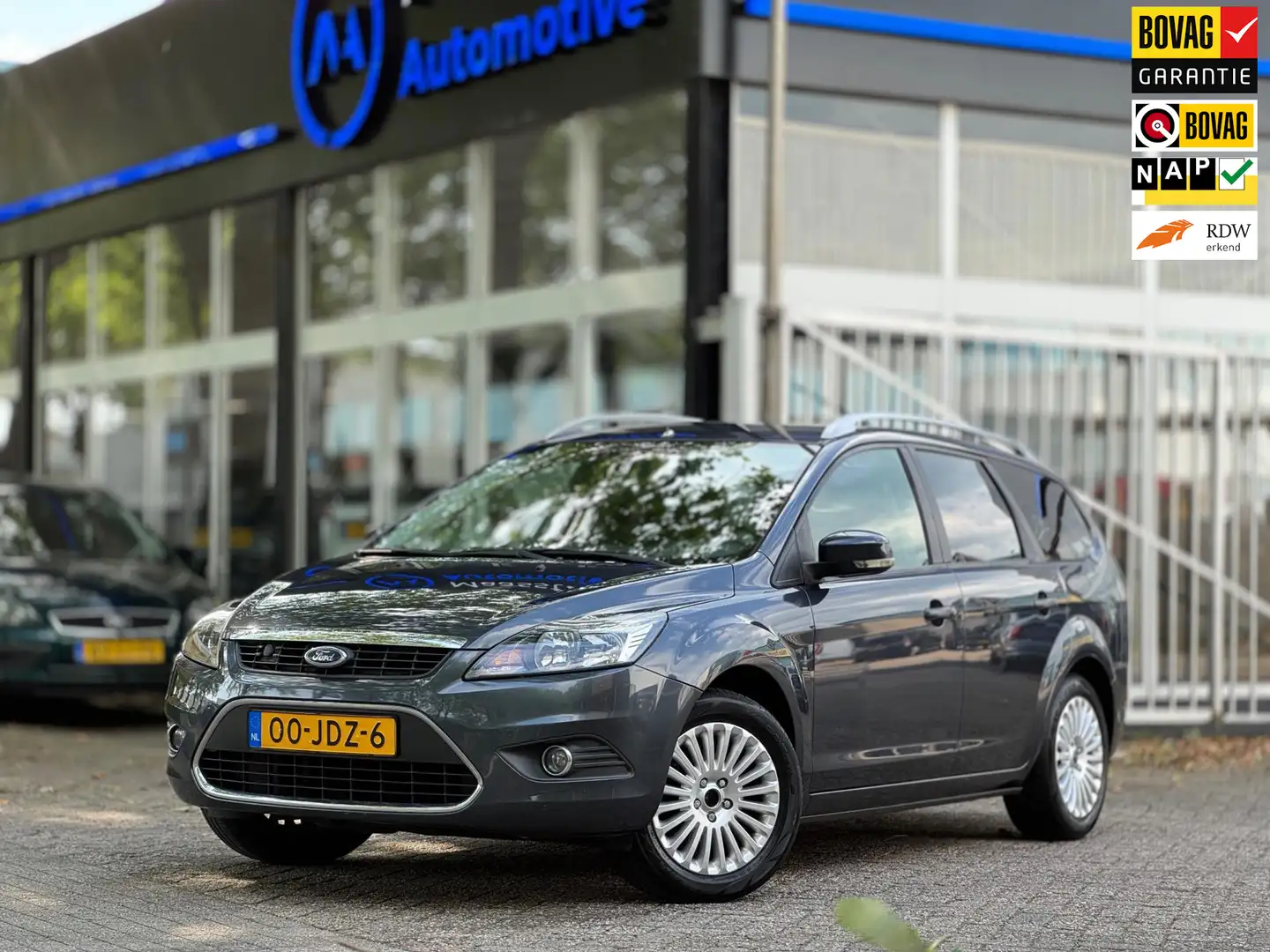 Ford Focus Wagon 1.8 Titanium F-F Navi Cruise Parkeersensor T Grijs - 1
