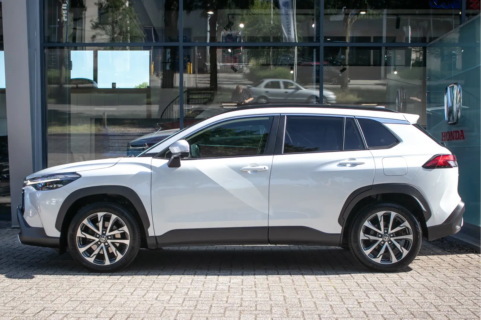 Toyota Corolla Cross 2.0 High Power Hybrid Launch Edition - All in rijk Wit - 2
