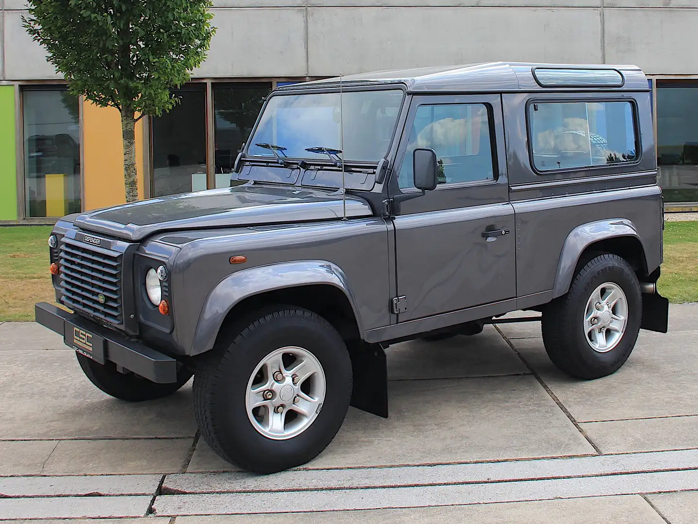 Land Rover Defender 2.5 Td5 SE 59.000km 1ste eigenaar! Airco! Gris - 1