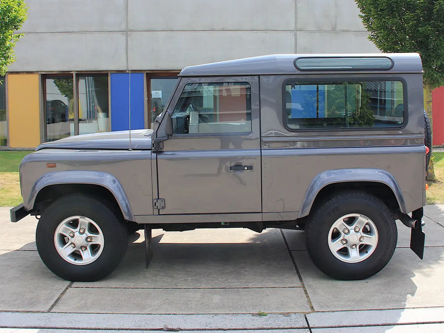 Land Rover Defender 2.5 Td5 SE 59.000km 1ste eigenaar! Airco! Gris - 2