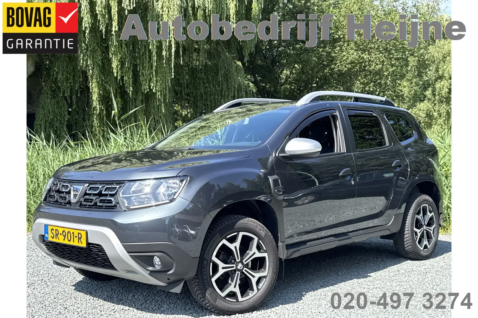 Dacia Duster 1.2 TCe PRESTIGE CAMERA/NAVI/TREKHAAK Grijs - 1