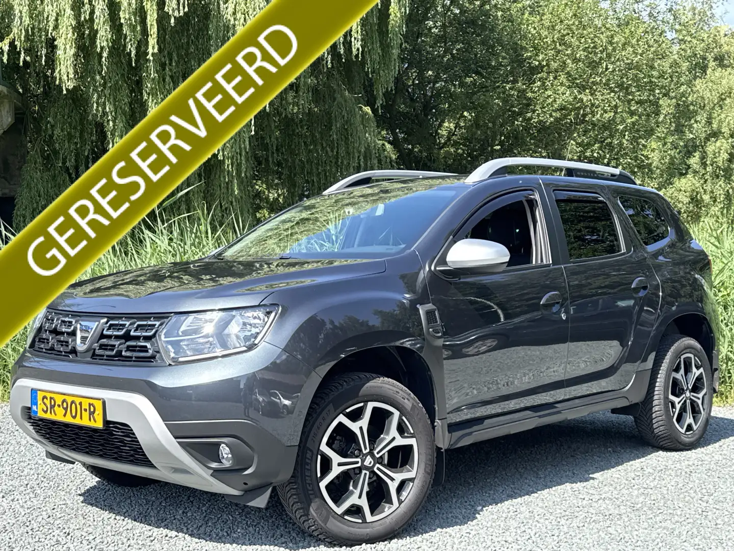 Dacia Duster 1.2 TCe PRESTIGE CAMERA/NAVI/TREKHAAK Grijs - 1