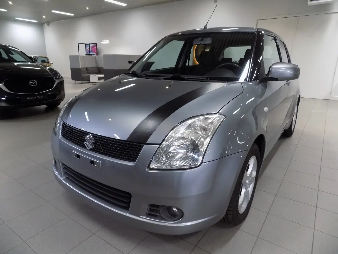 Suzuki Swift Swift 1.3 Comfort Gris - 1