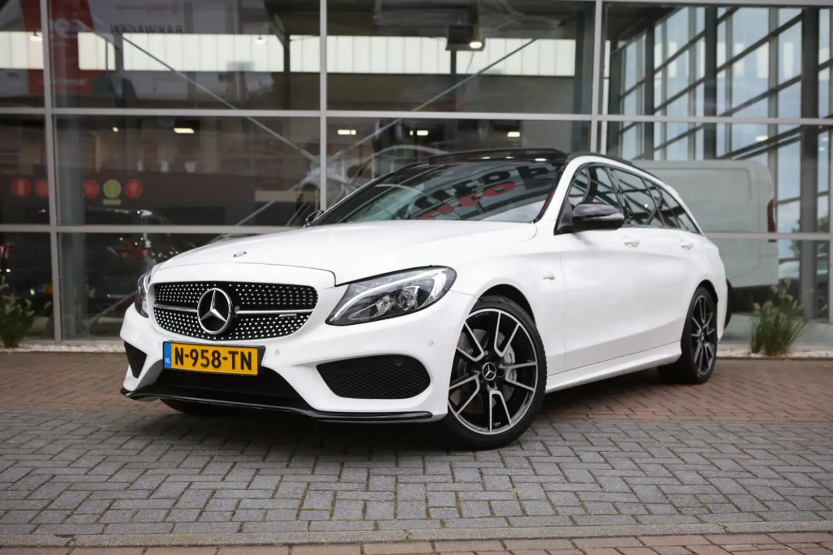 Mercedes-Benz C 43 AMG Estate 4MATIC | Nieuwstaat! | Burmester | Pano | T Weiß - 1