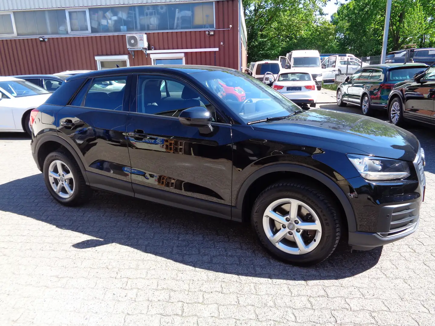 Audi Q2 1.0 TFSI ultra, Klimatr., SHZ, PDC, Navi Schwarz - 1