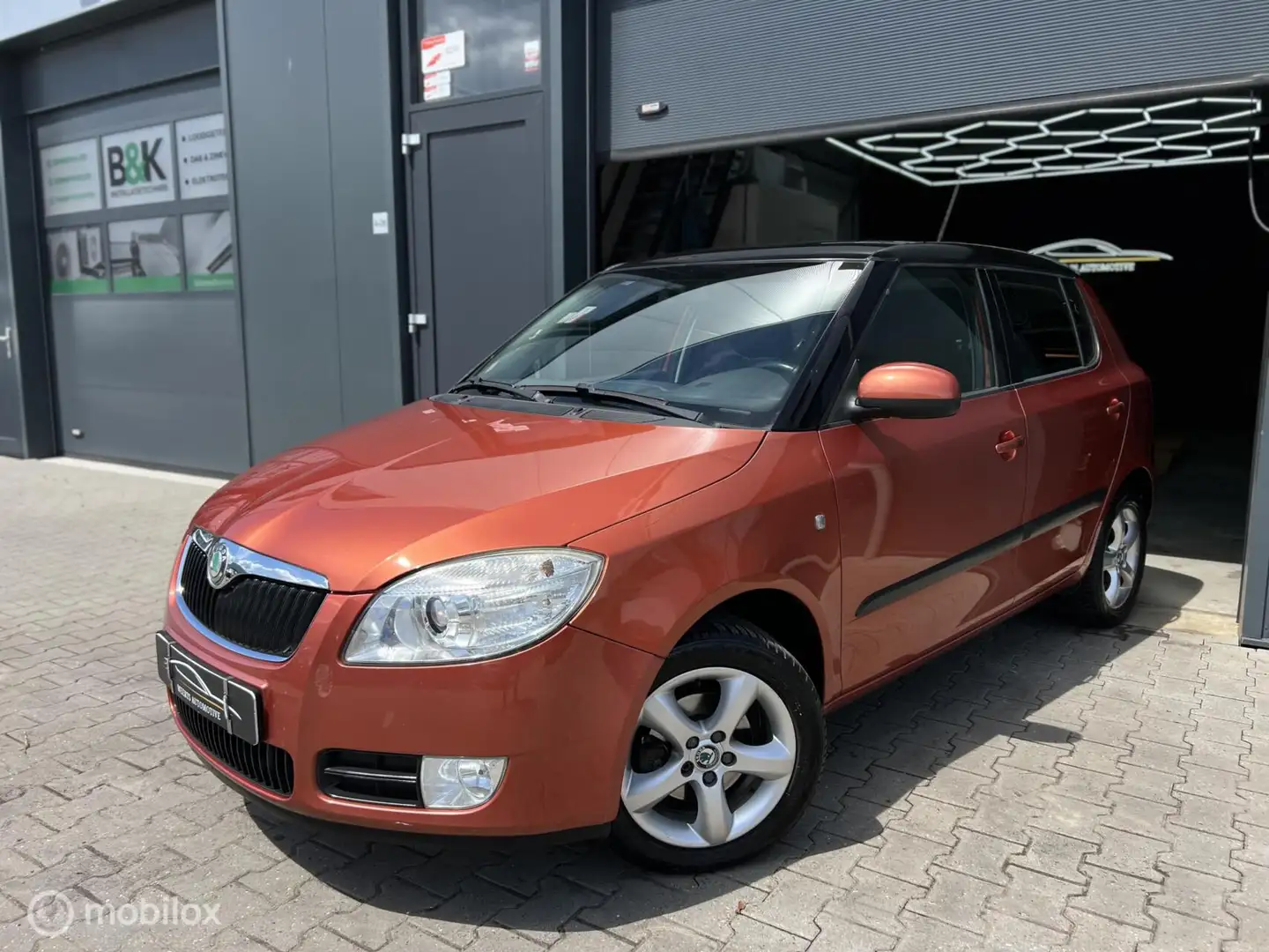 Skoda Fabia 1.4 SPORT |BI XENON|AIRCO|CRUISE|PDC|TREKHAAK| Orange - 1