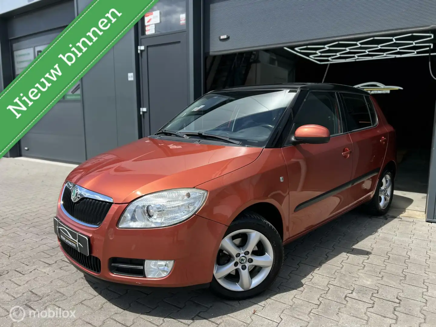 Skoda Fabia 1.4 SPORT |BI XENON|AIRCO|CRUISE|PDC|TREKHAAK| Oranje - 1