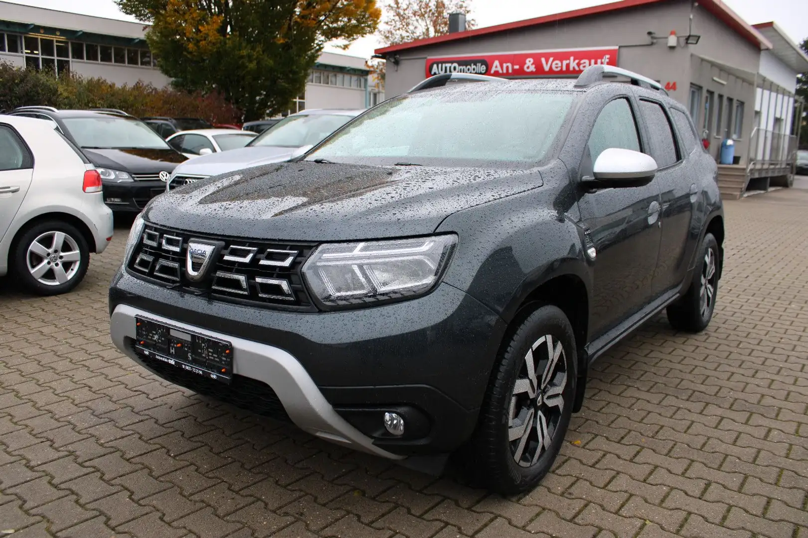 Dacia Duster TCe 150 4x4 Navi,LED,Kamera,AHK Grau - 1