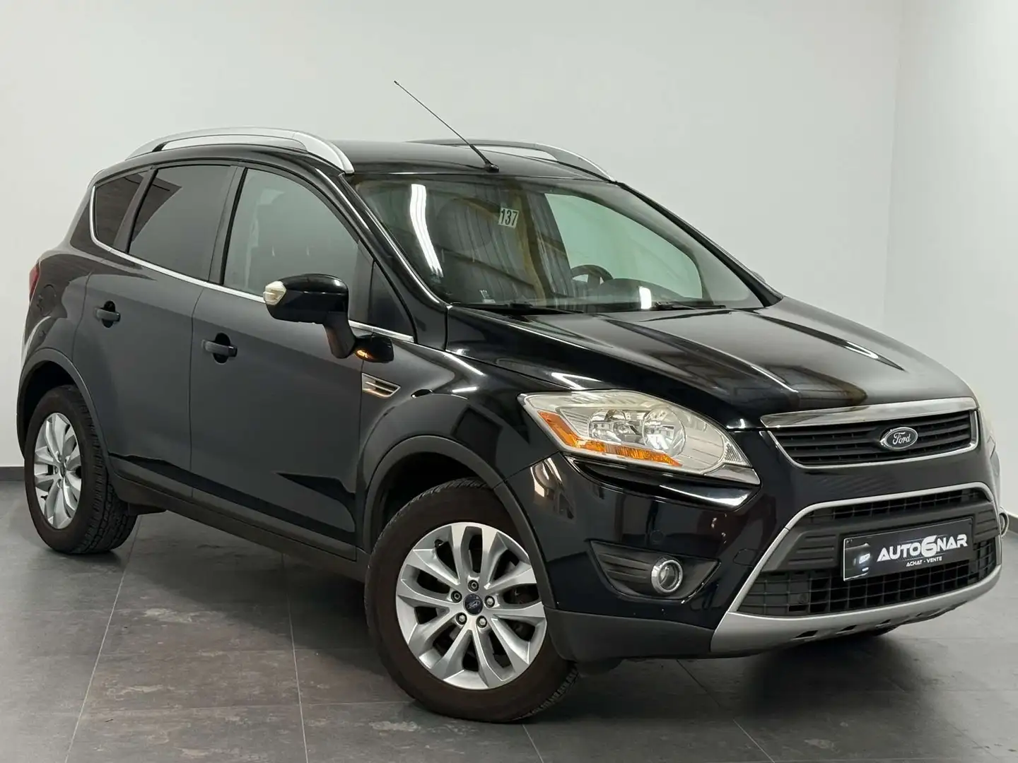 Ford Kuga 2.0 TDCi 4WD Titanium Carnet - Airco Negro - 1