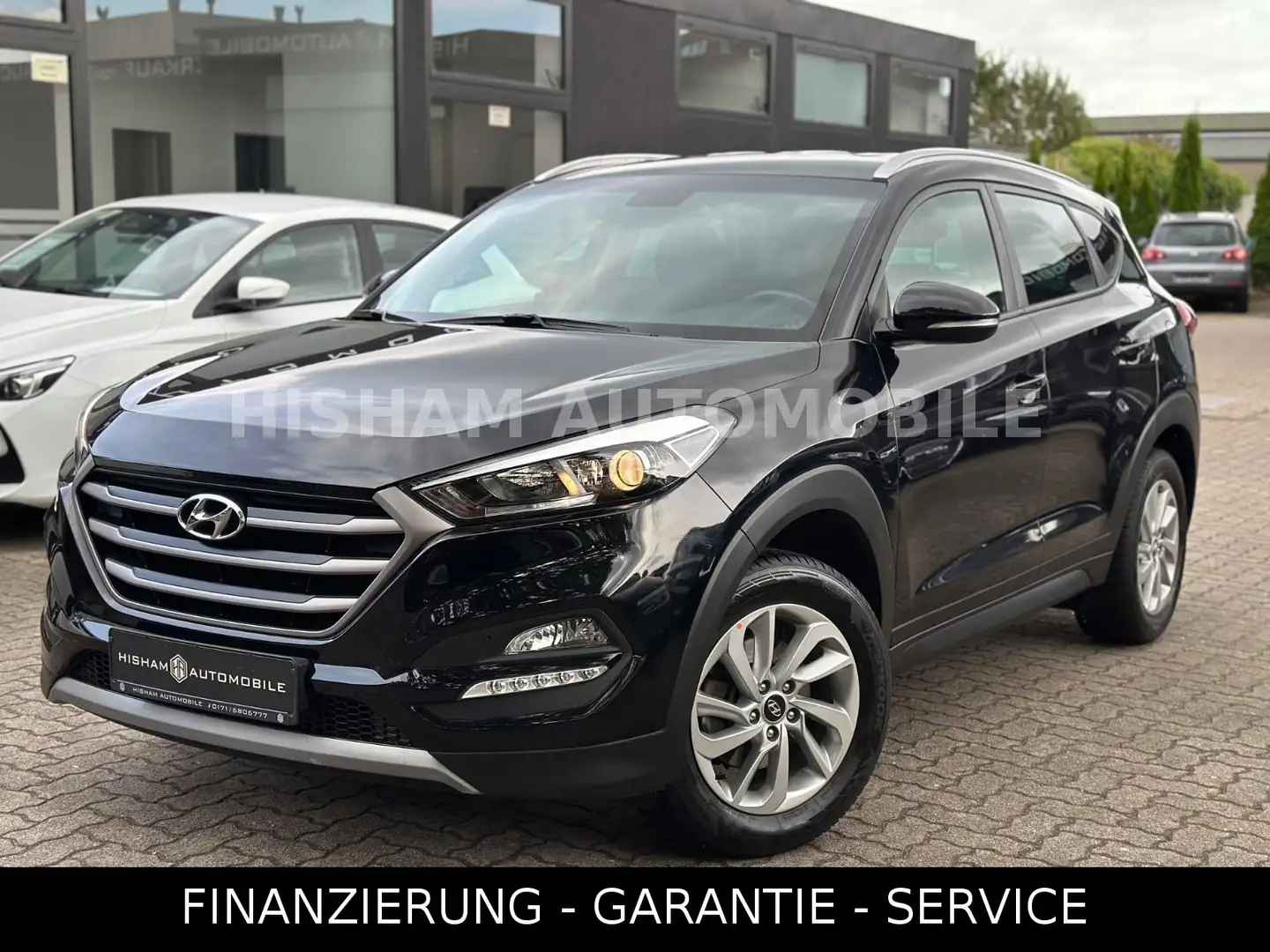 Hyundai TUCSON Trend 2WD/NAVI/KAMERA/ALU/WENIG KM/EURO-6 Schwarz - 1