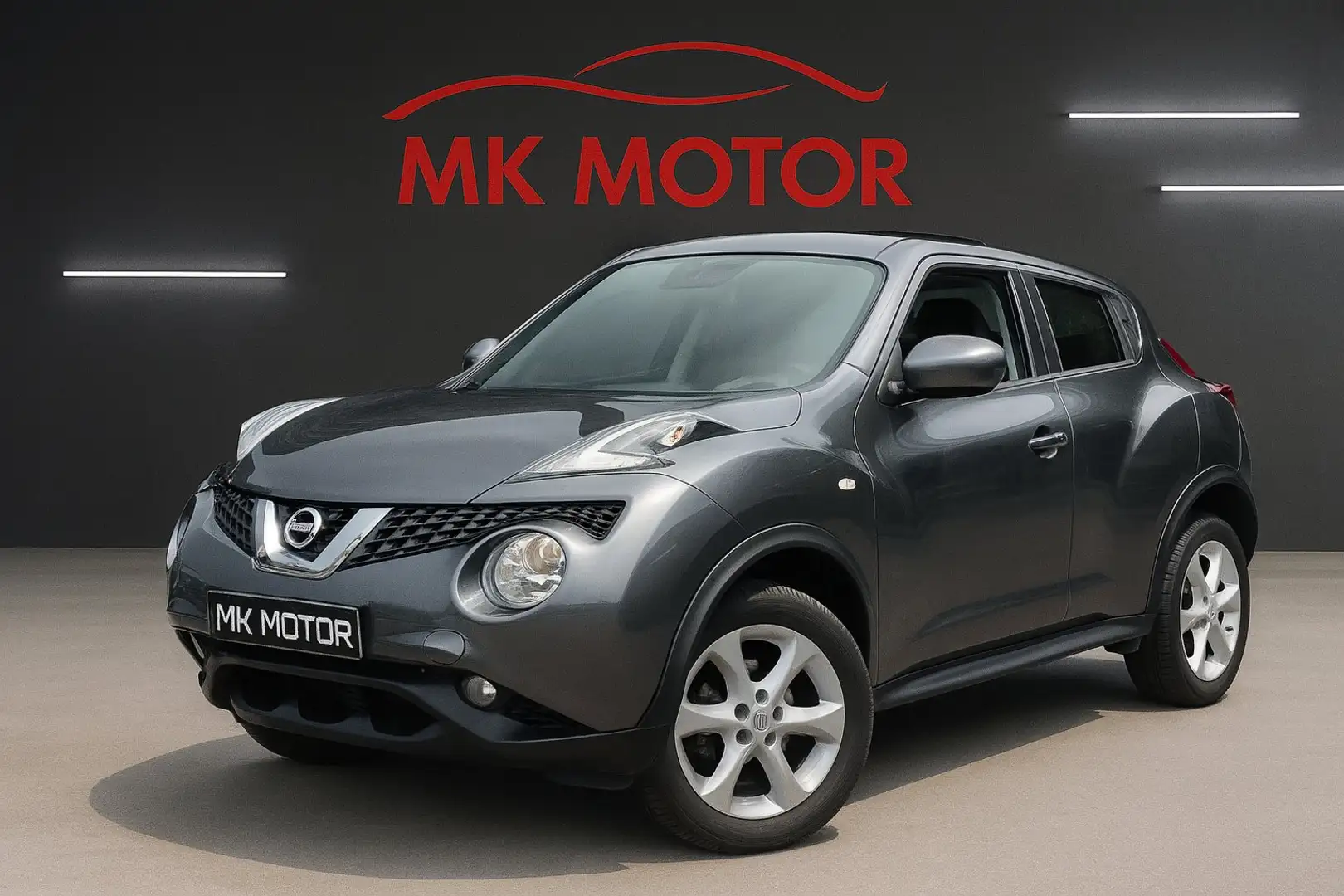 Nissan Juke 🟢1.6 ESSENCE 117CV / GPS / CAMERA / AIRCO Grijs - 1