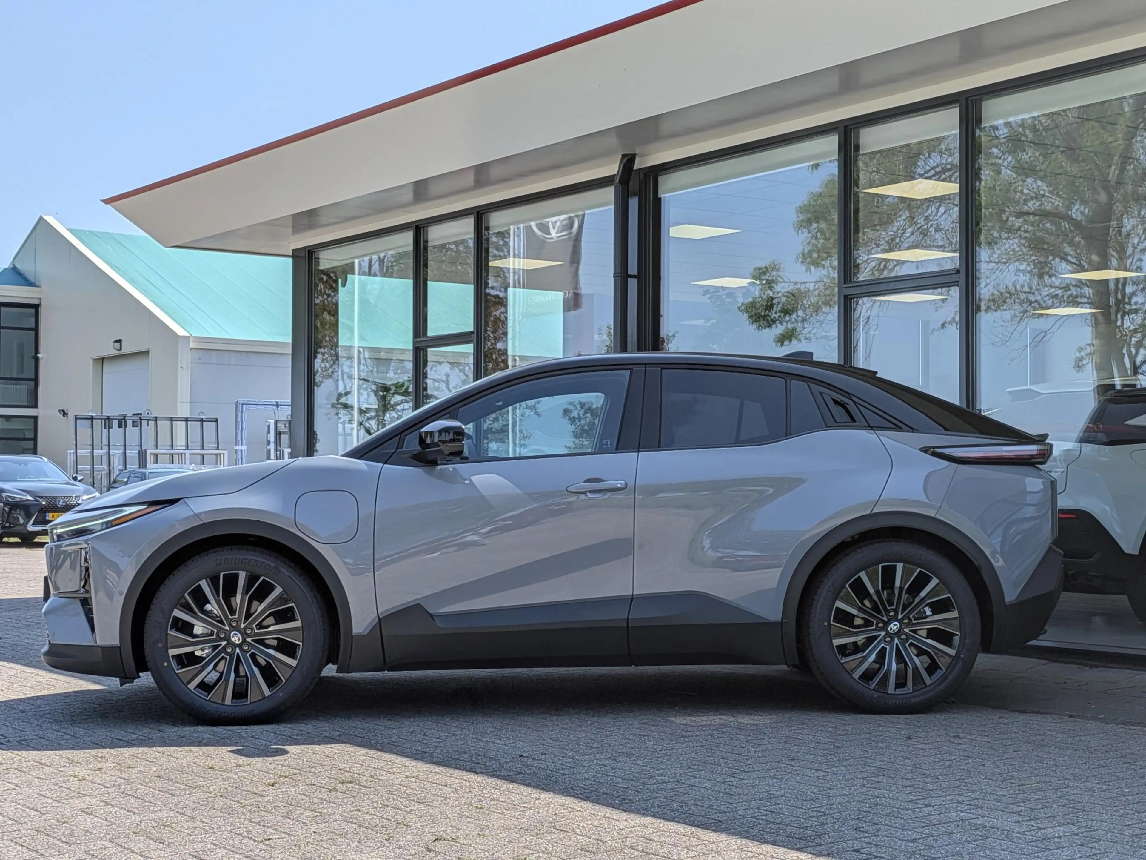 Toyota C-HR+ Executive AWD 77 kWh Nieuw op voorraad | JBL | Pan — photo 9