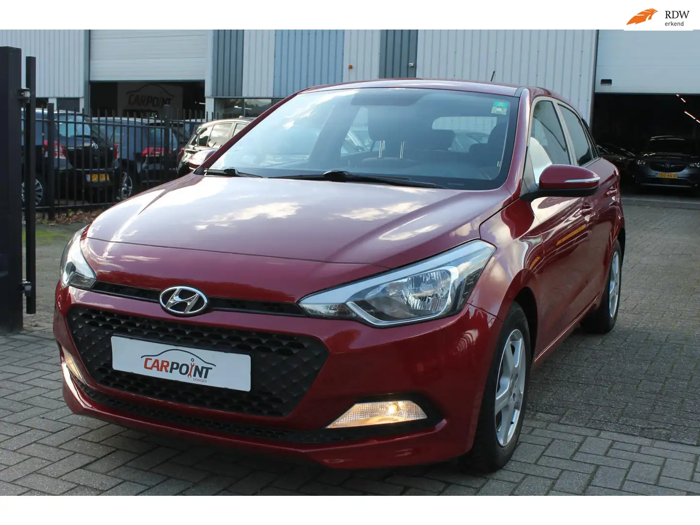 Hyundai i20 1.4i Automaat i-Motion Airco 5drs 1e Eigenaar Rouge - 1